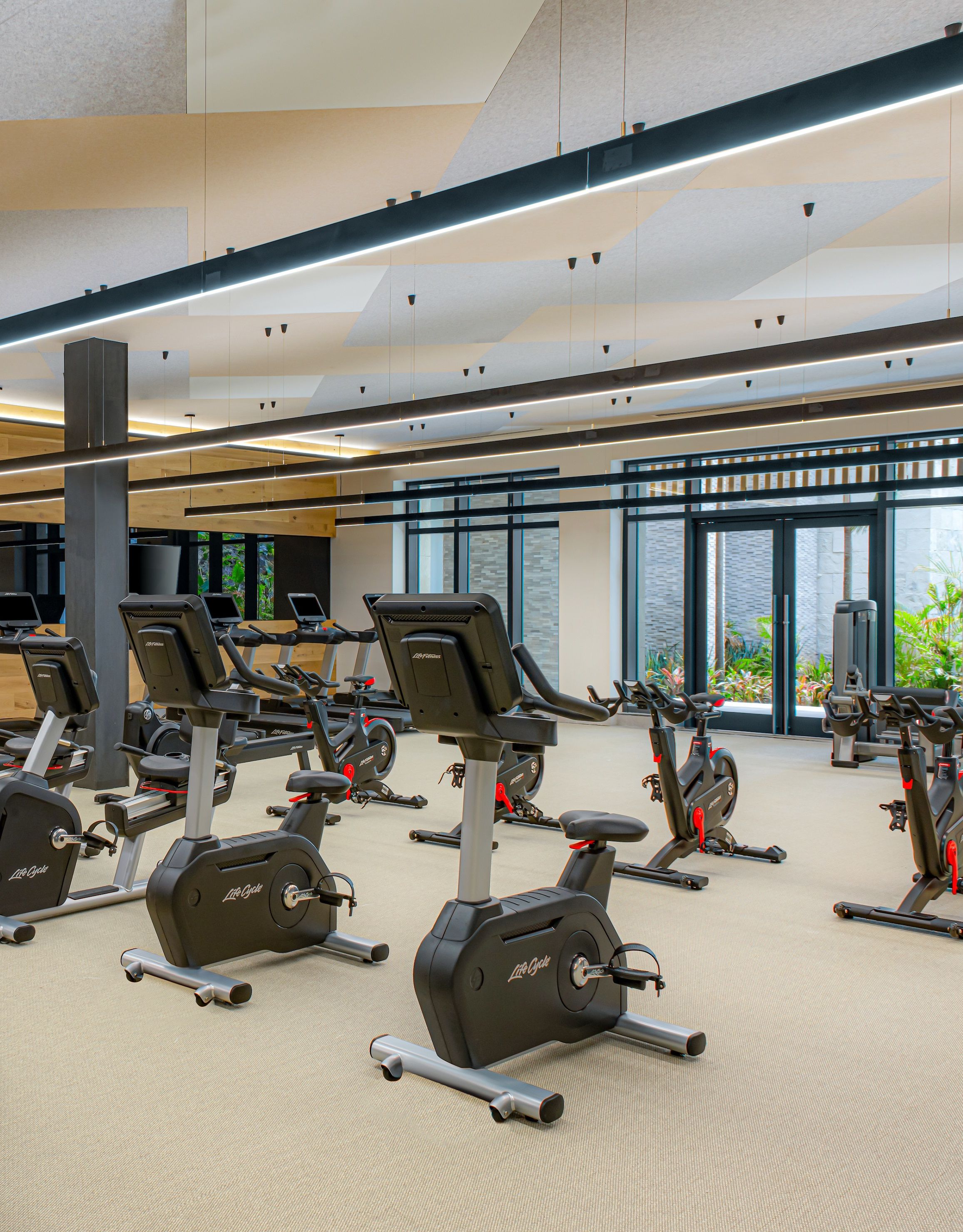 Fitness Center with Treadmills Recumbent Bikes and Other Equipment