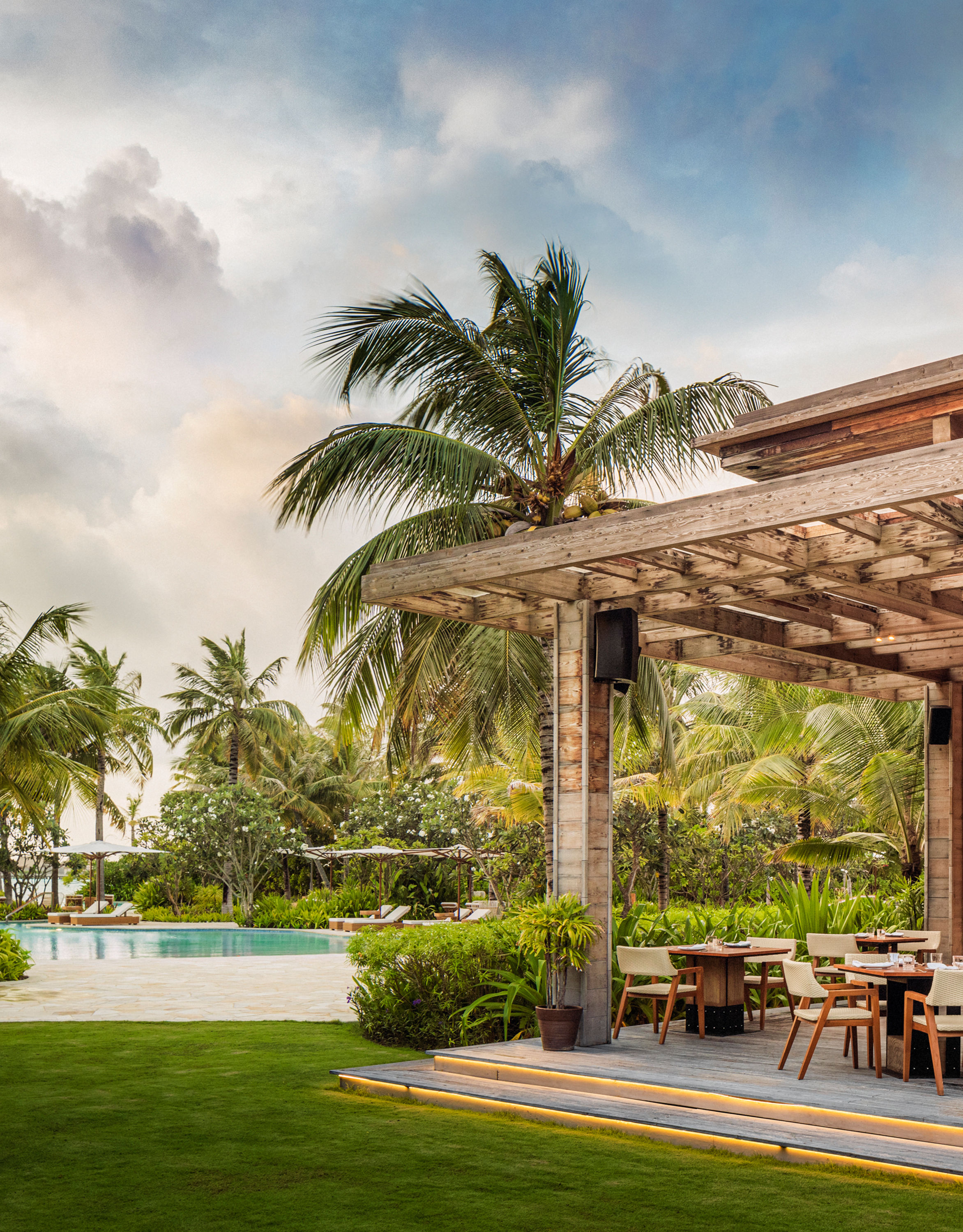 Outdoor seating area with tables and chairs