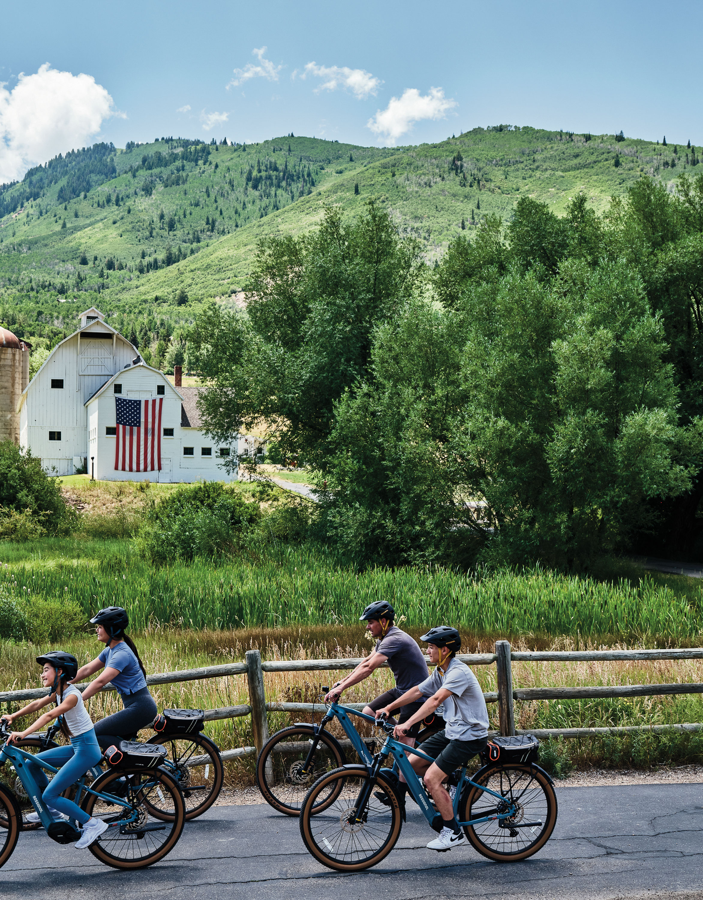 A Group of People Riding Bicycles Outdoors