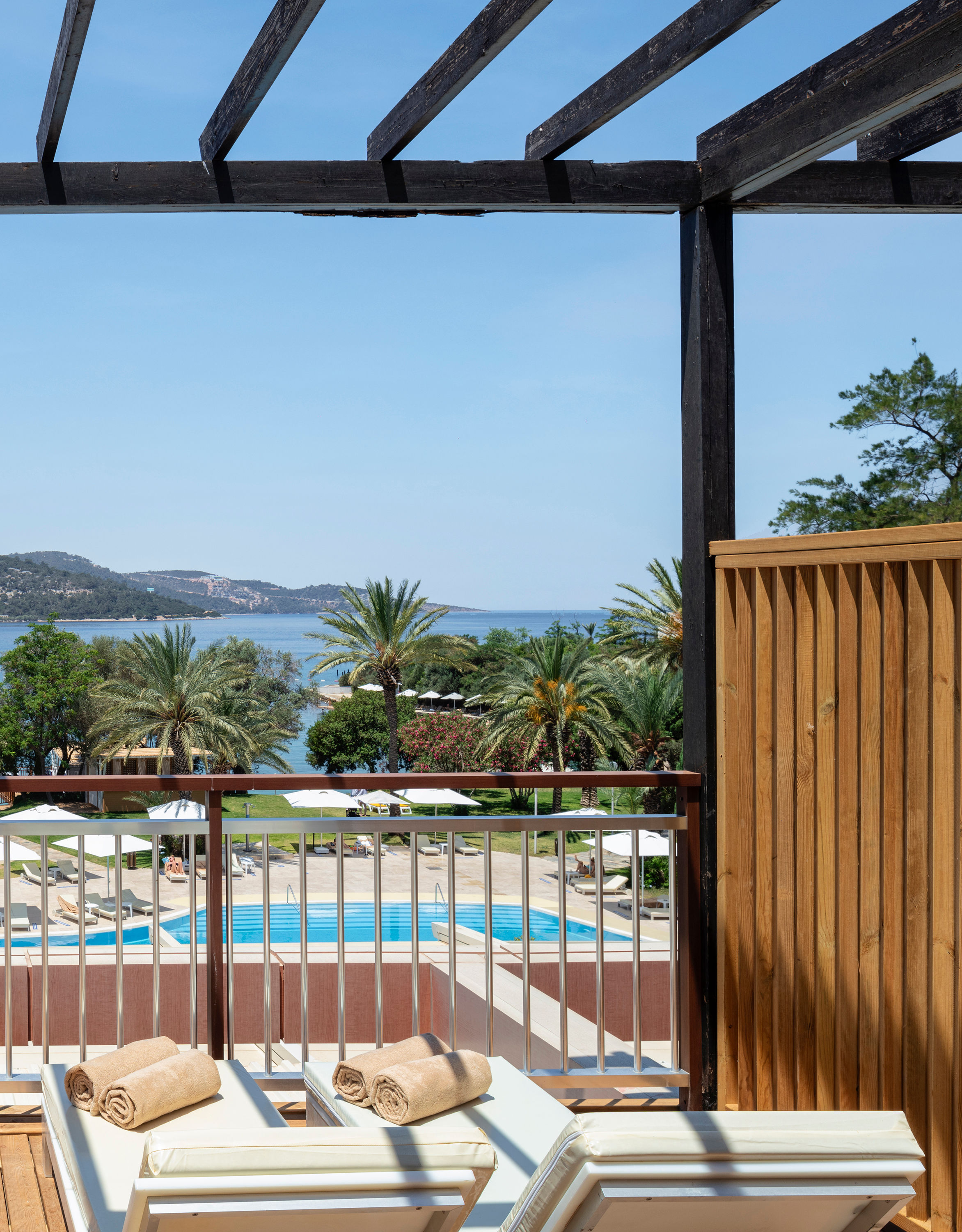 Guestroom balcony with loungers