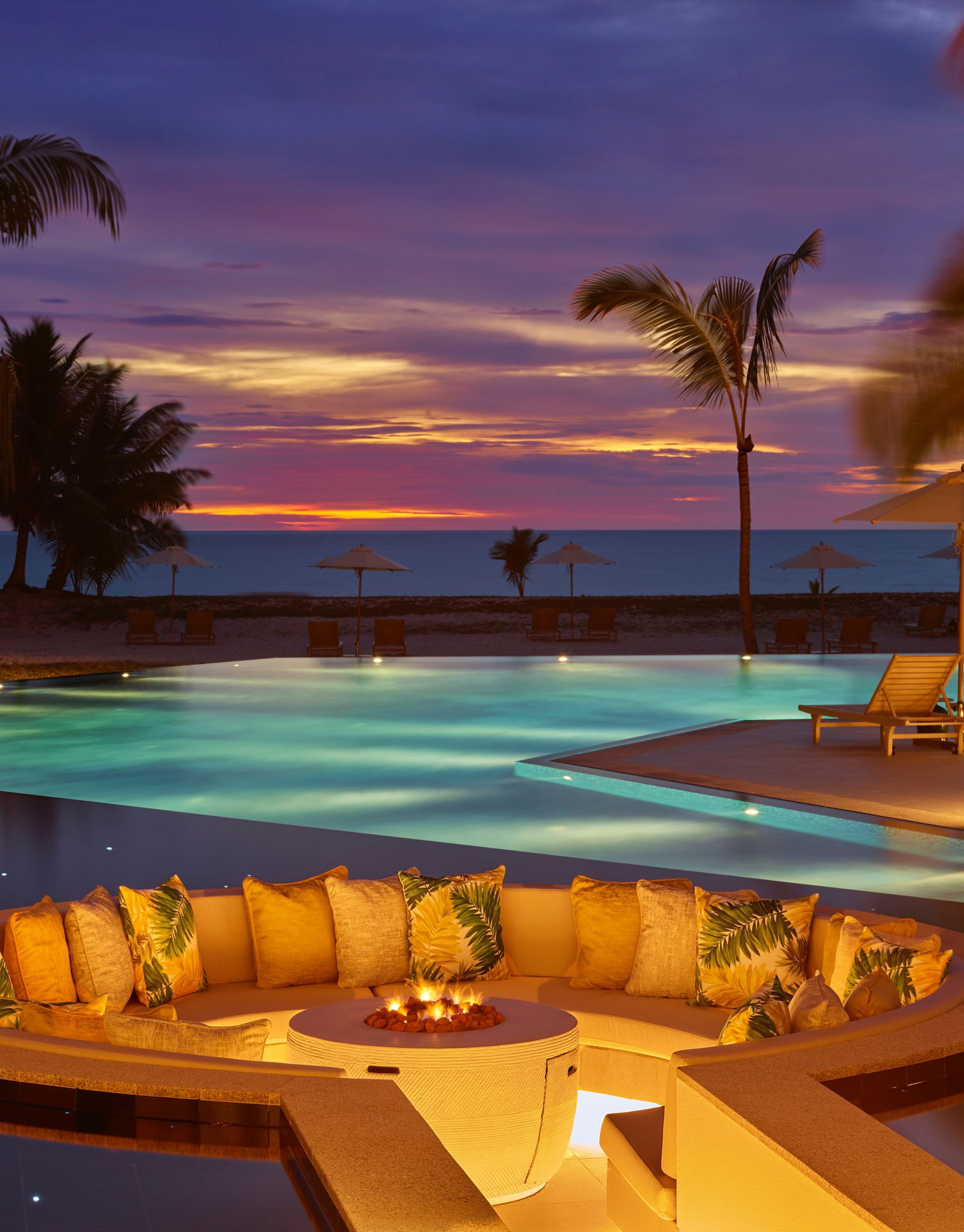 La Perle Lounge with View of the Pool Area at Sunset