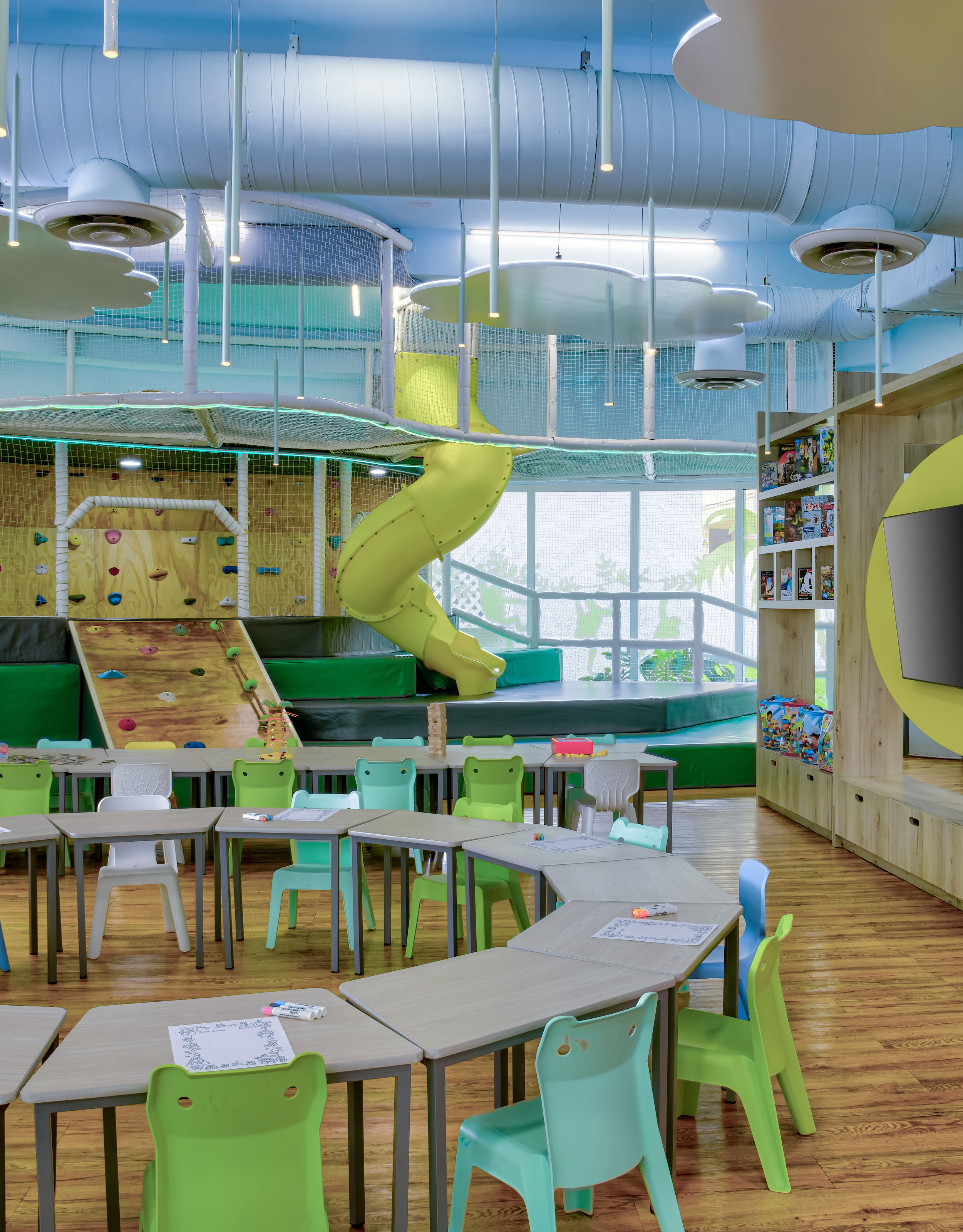 entertainment area with chairs and tables