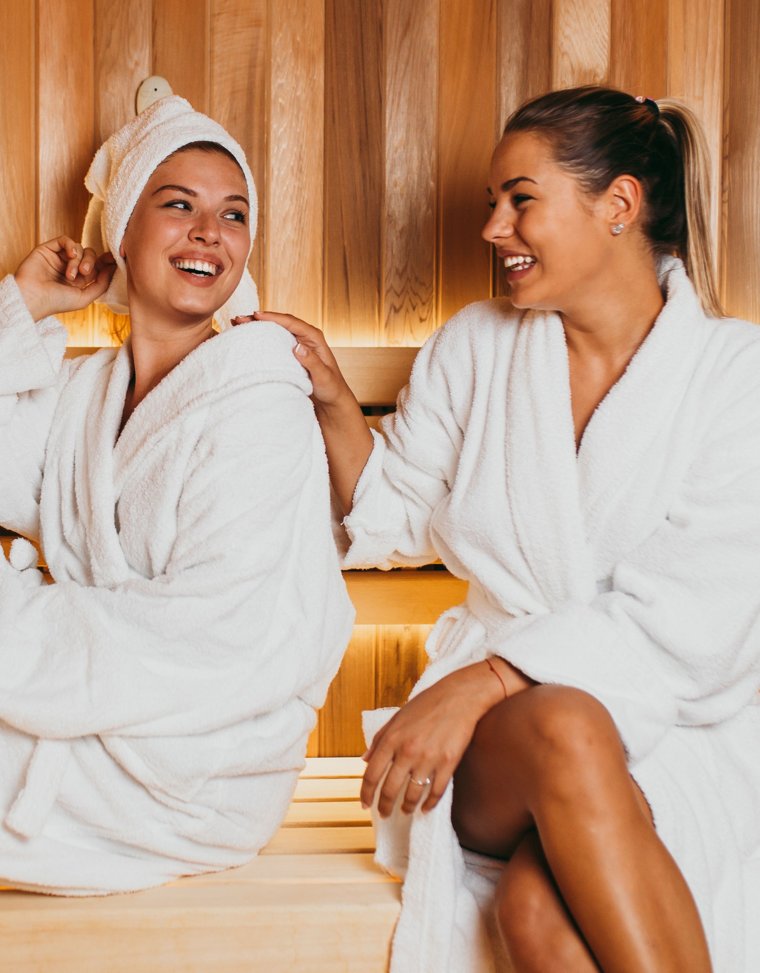 Two Women Enjoying a Dry Sauna at the Spa