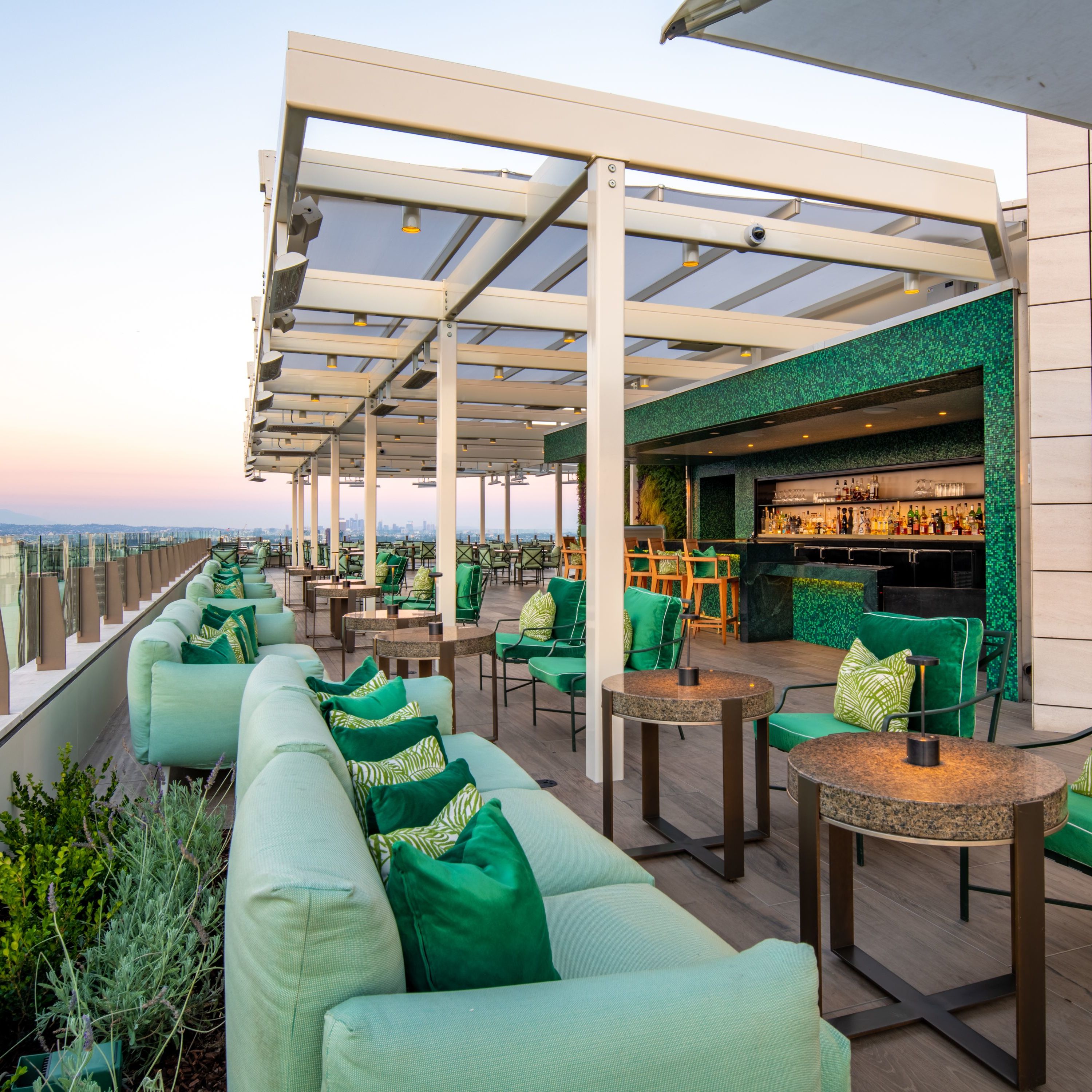 Rooftop seating area with tables