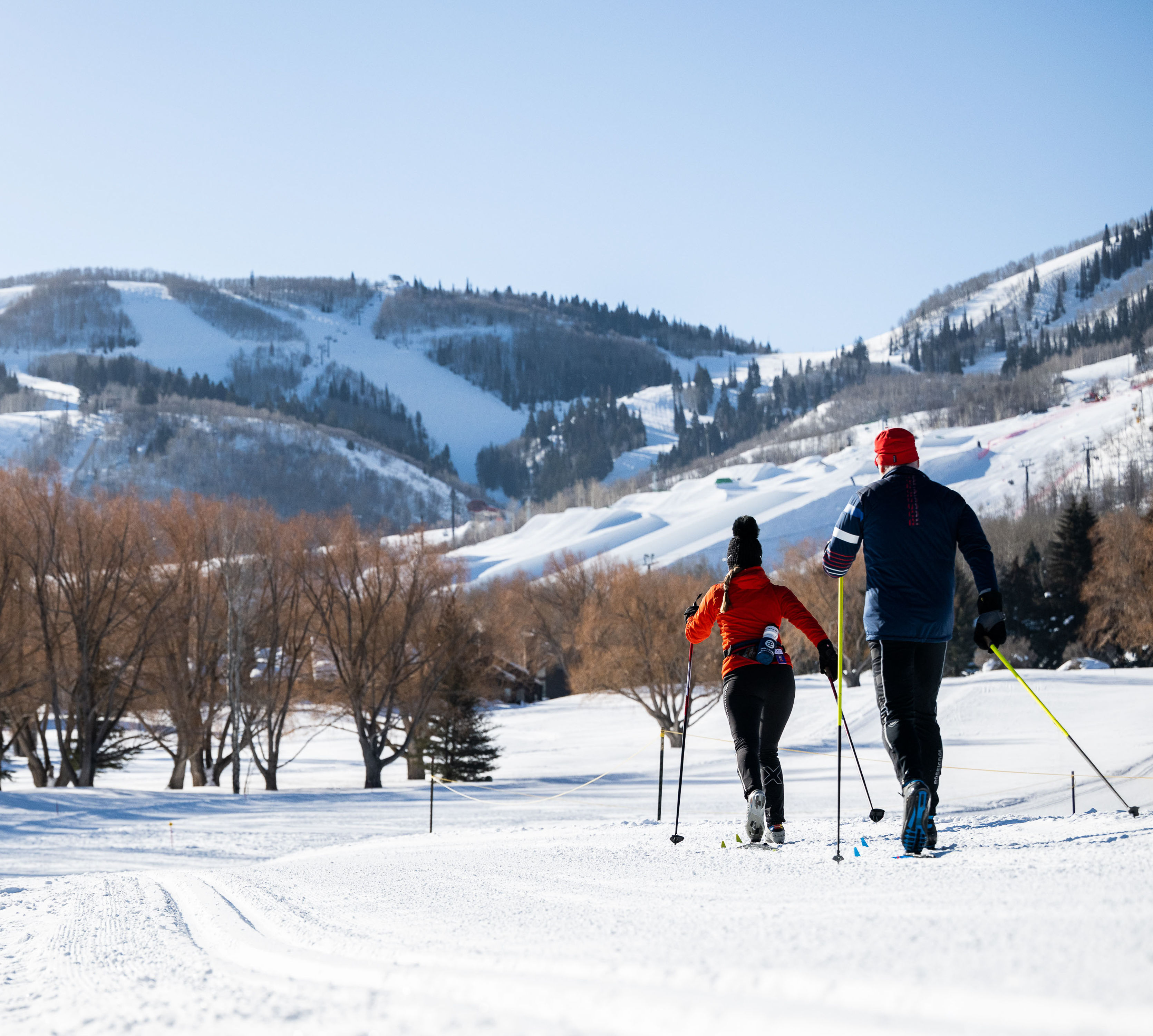 Couple Cross Country Skiing on a Mountain