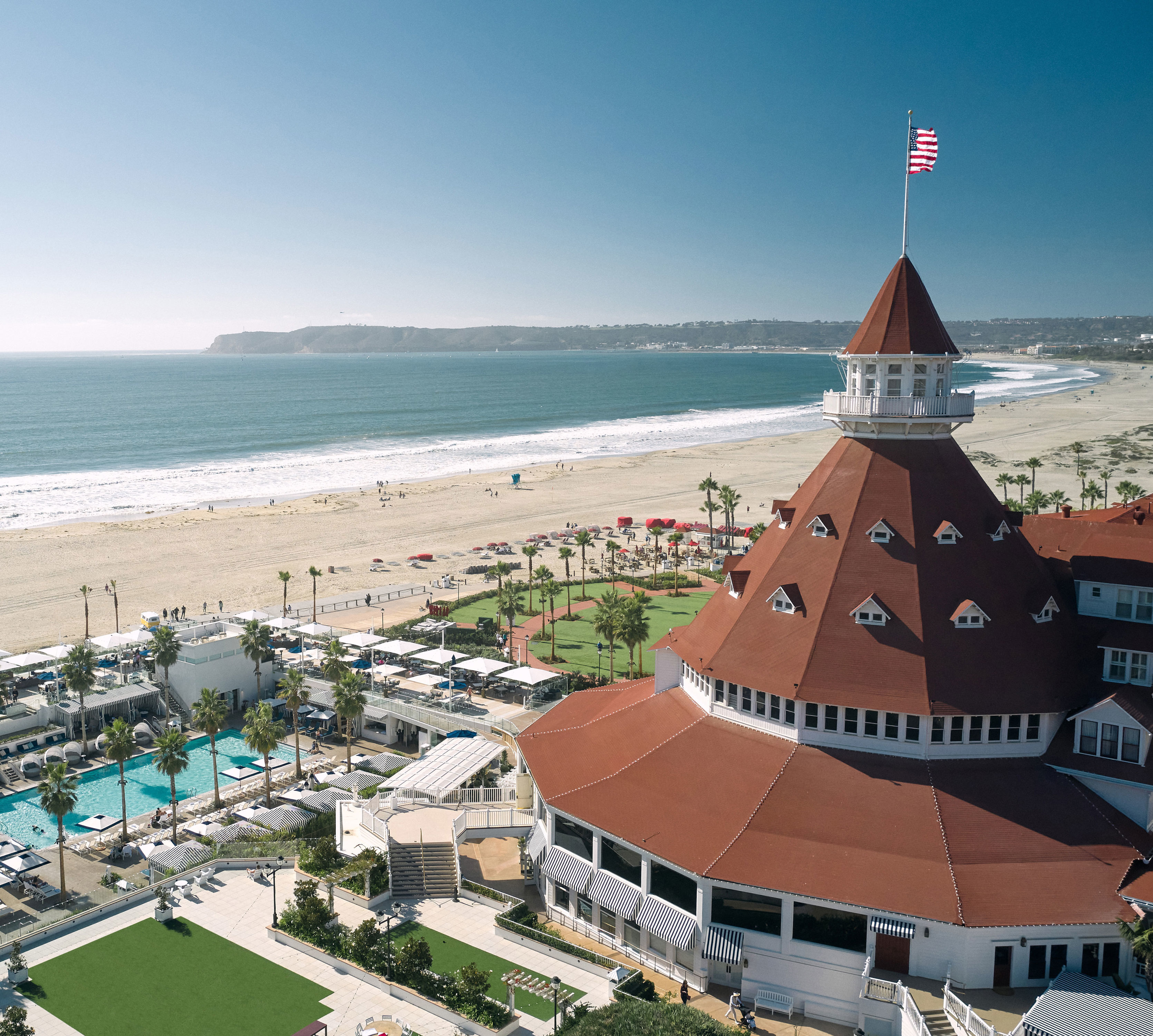 Hotel Exterior with Pool Area by the Beach