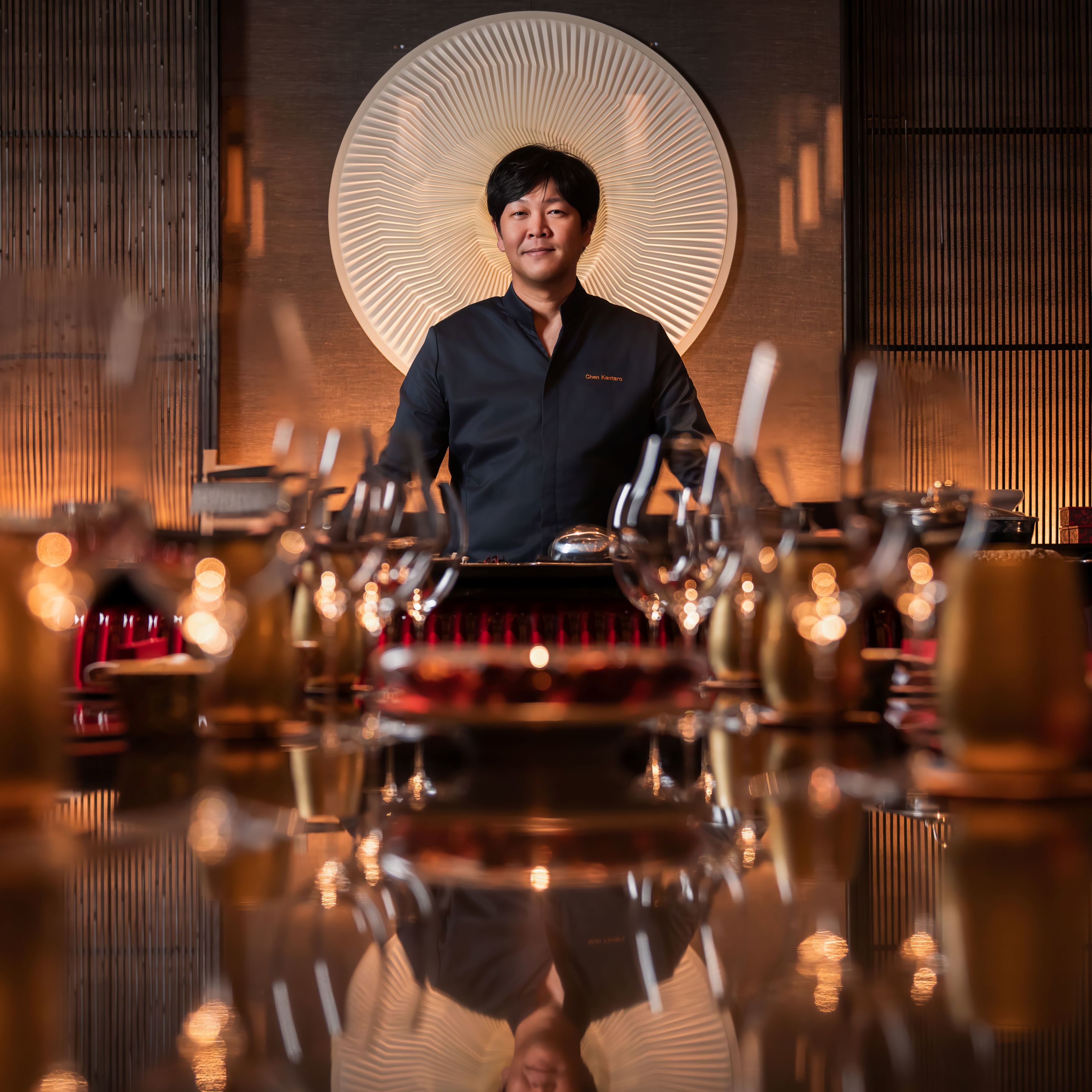 Shisen Hanten Chef standing at the top of the table