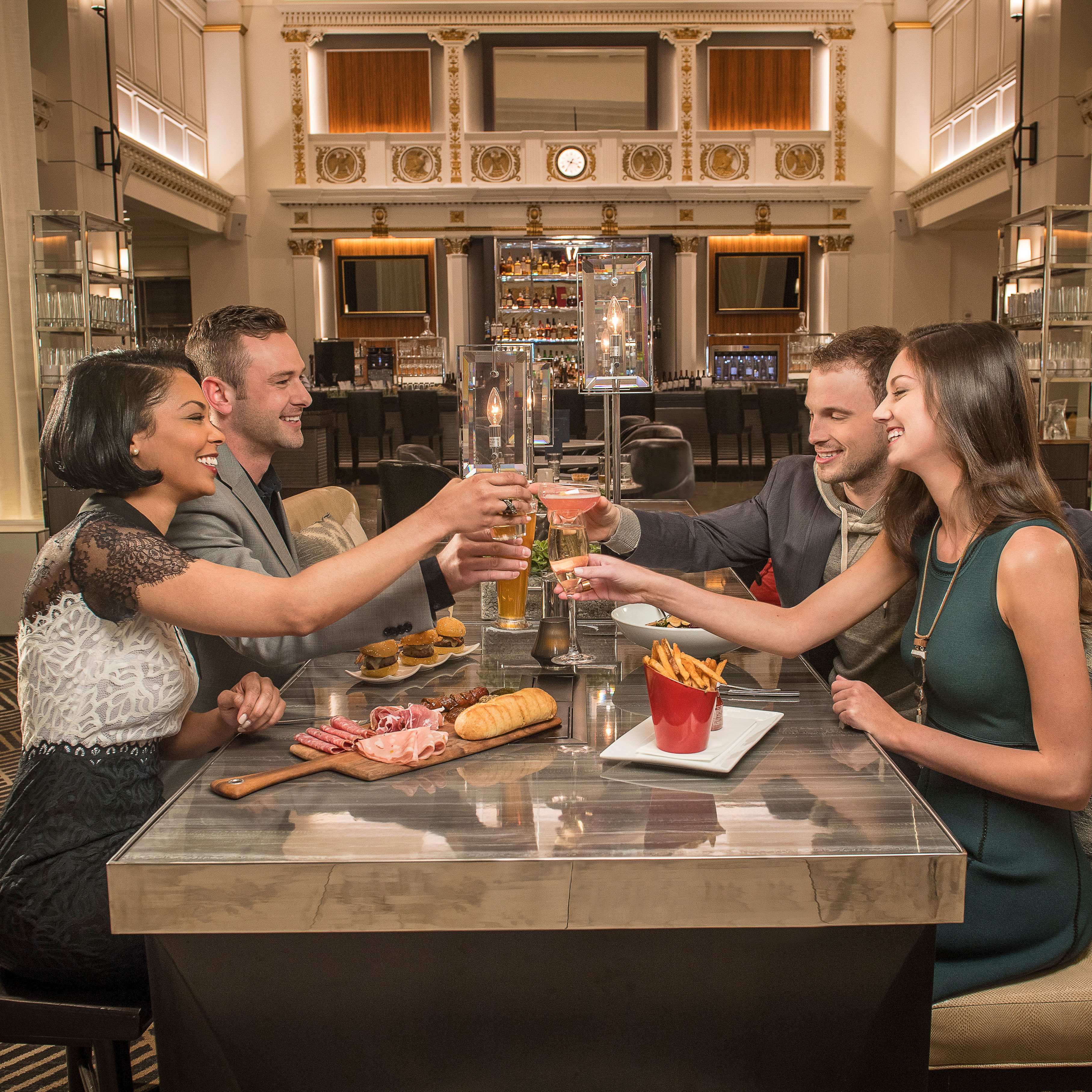 two couples dining in a restaurant