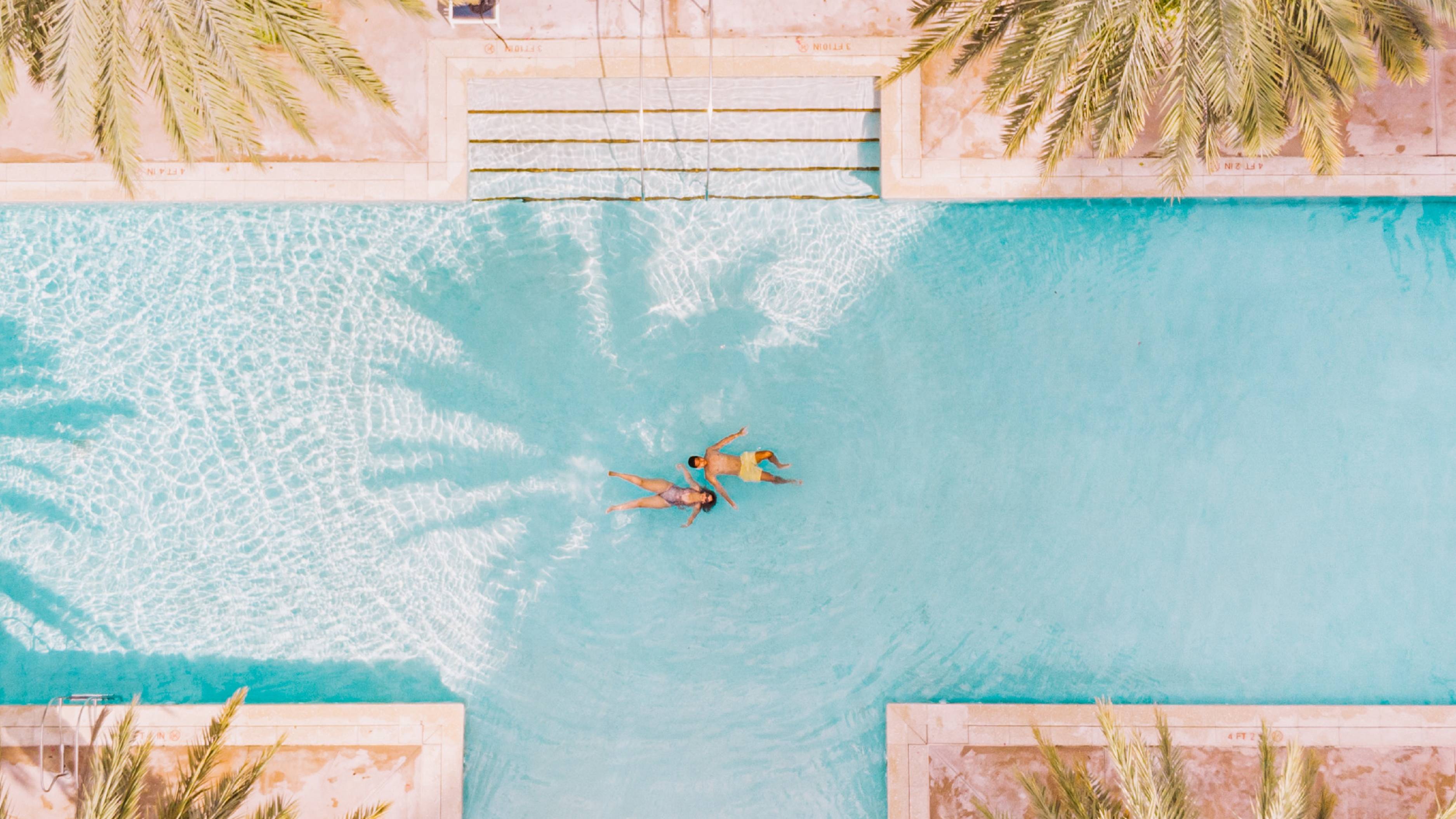 aerial view of pool with people