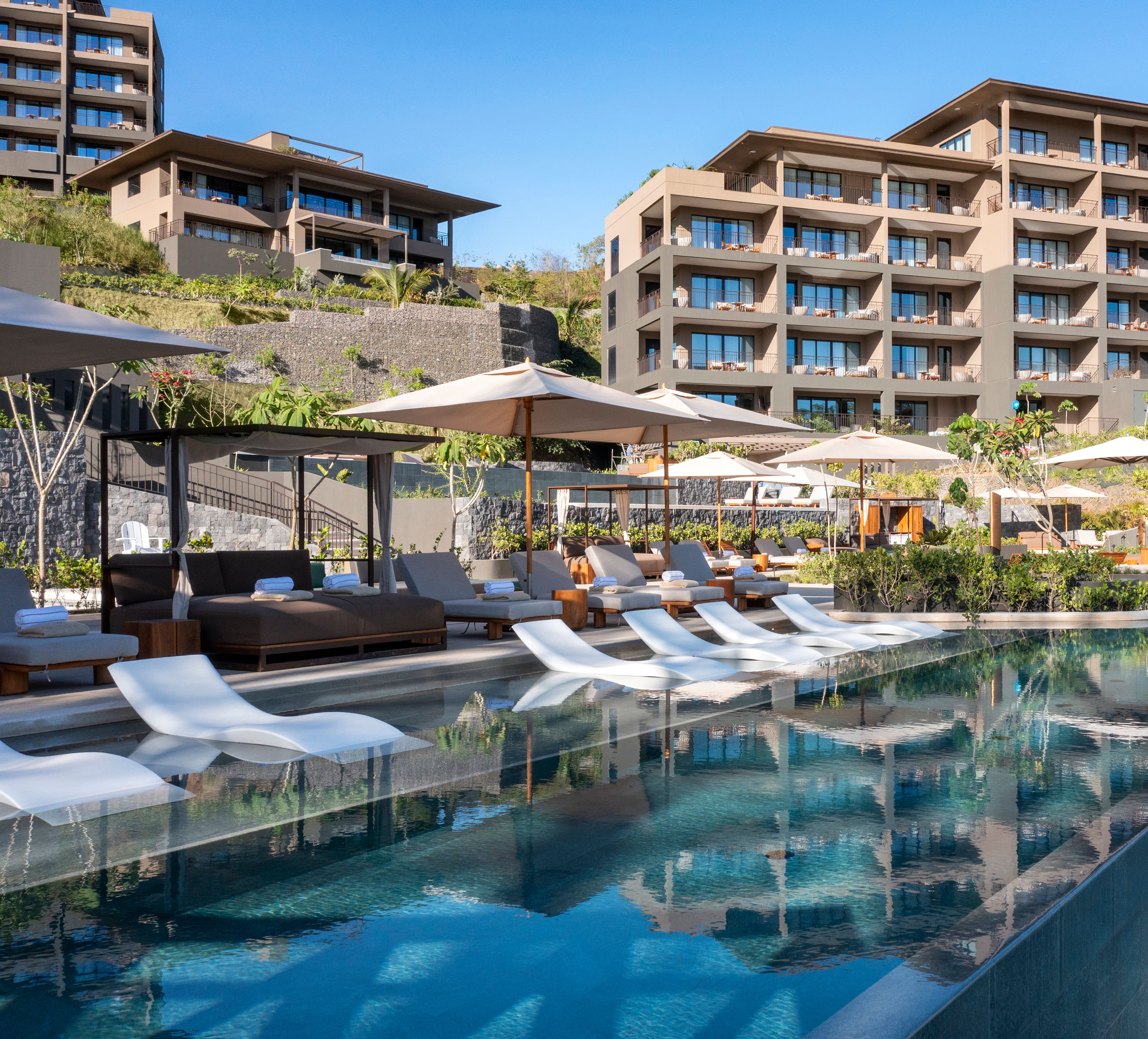 Outdoor Pool Area with Lounge Chairs