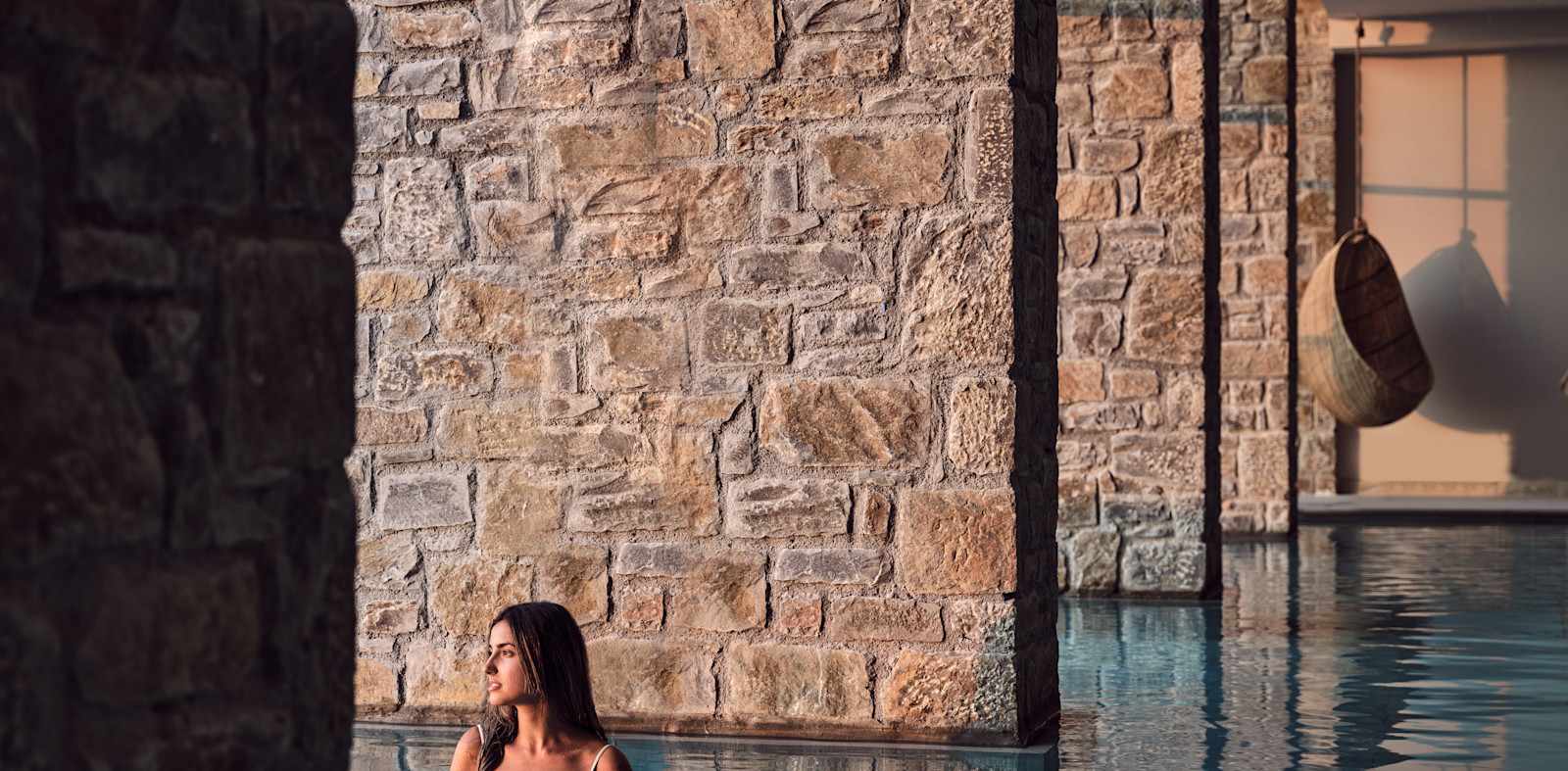 Woman in an Indoor Thalassotherapy Pool at the Spa