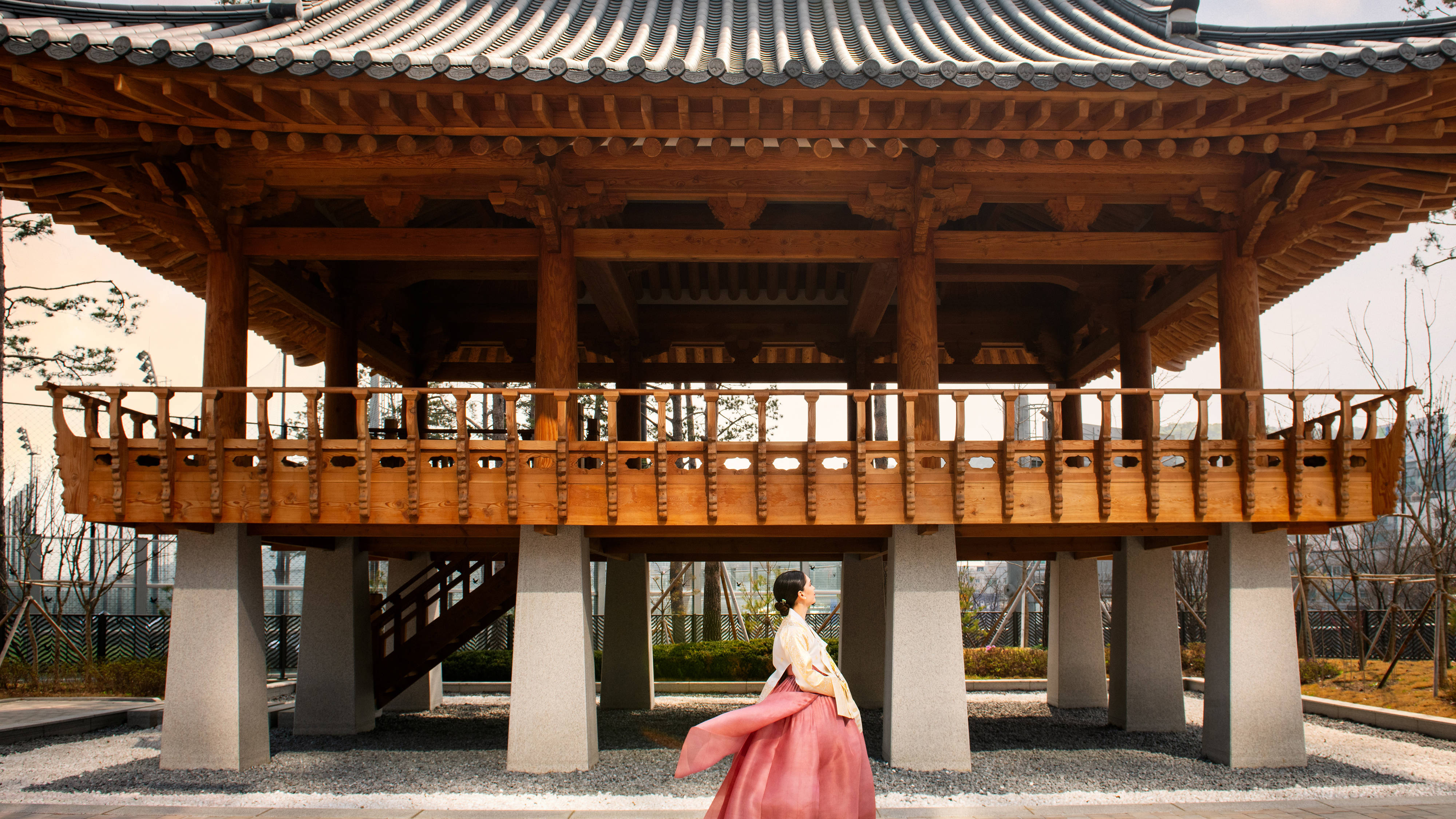 traditional structure outdoors with woman
