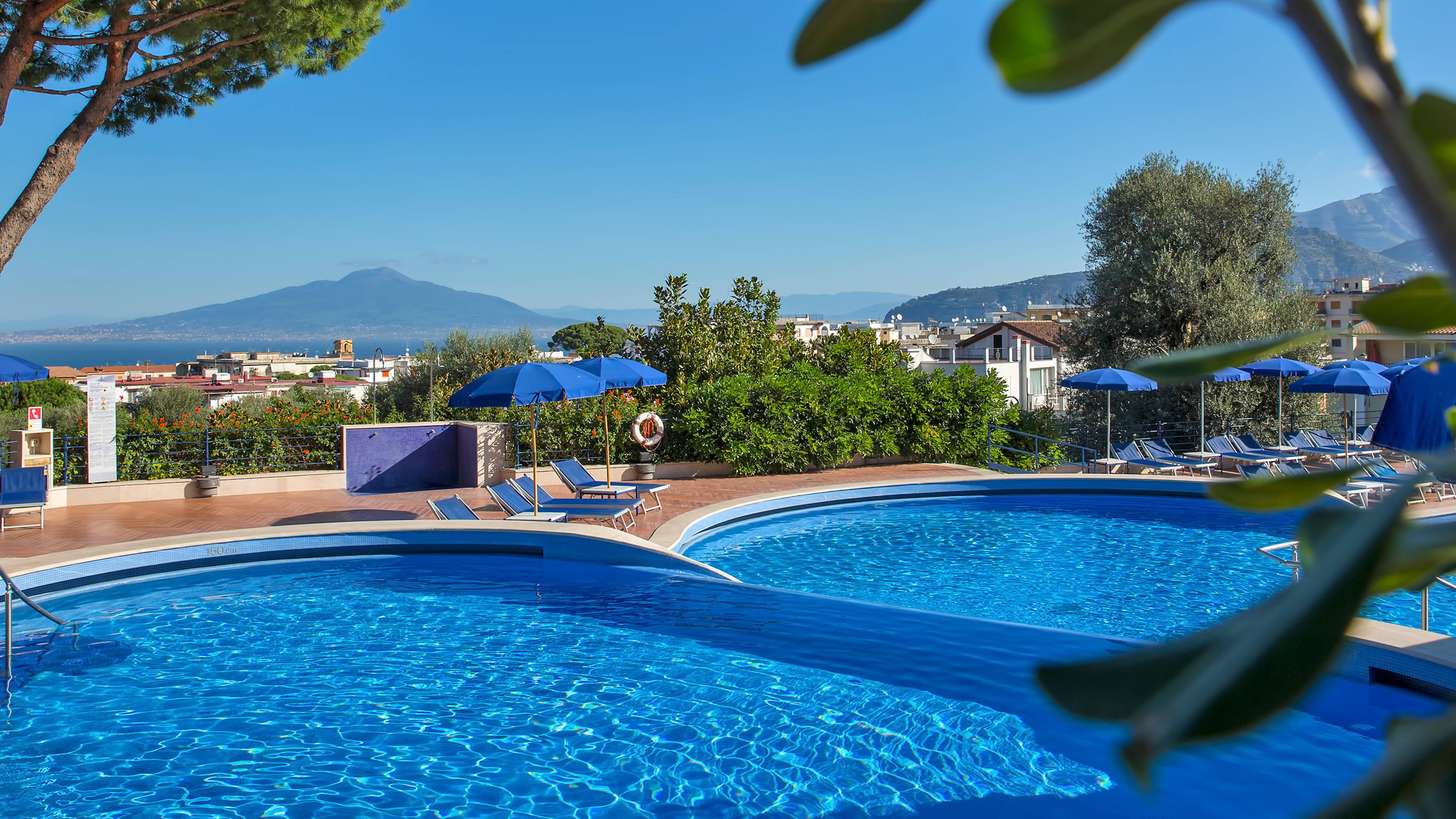 Hilton Sorrento Palace outdoor pool and view of Mt Vesuvius