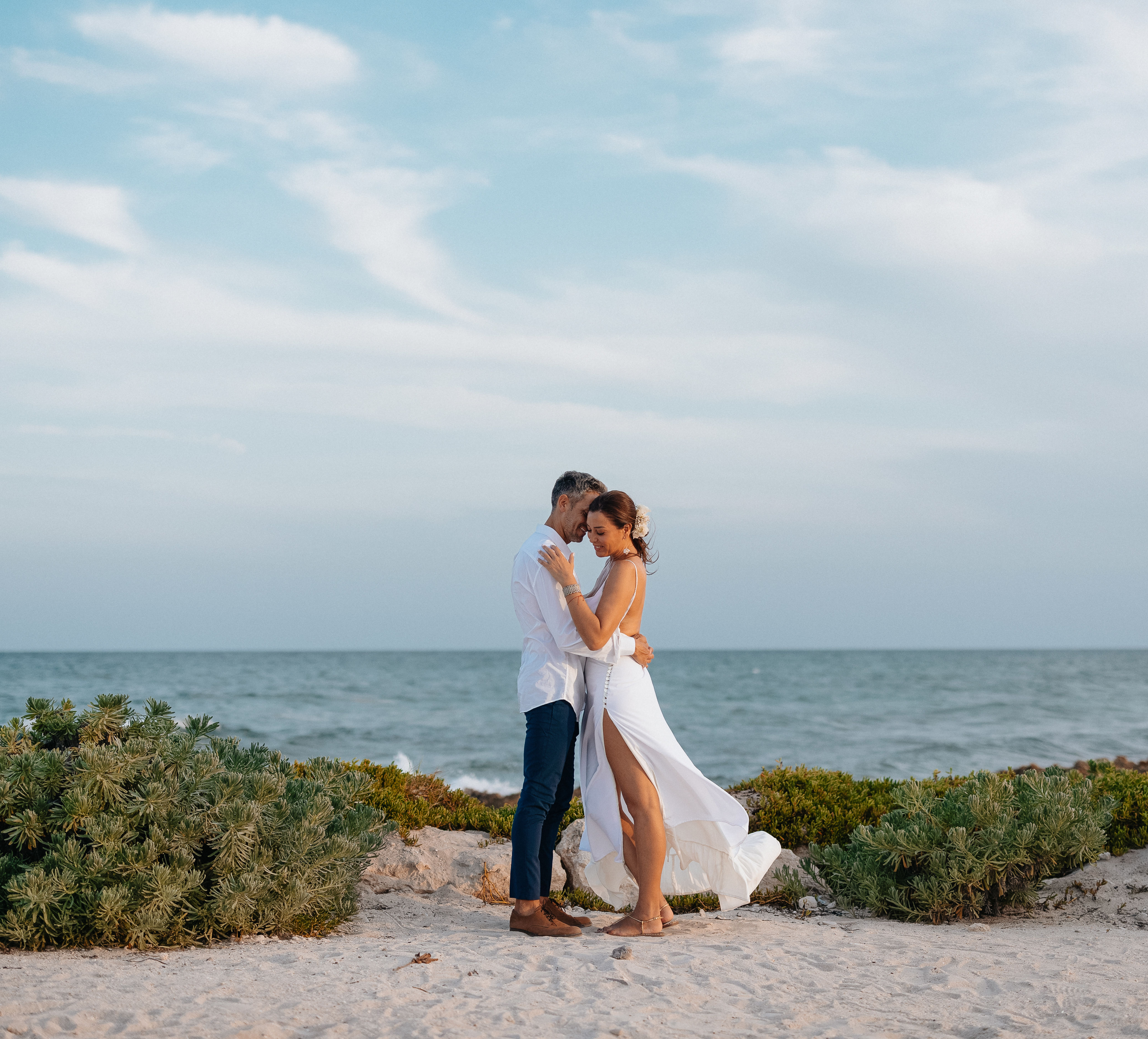 Couple embracing one another on beach