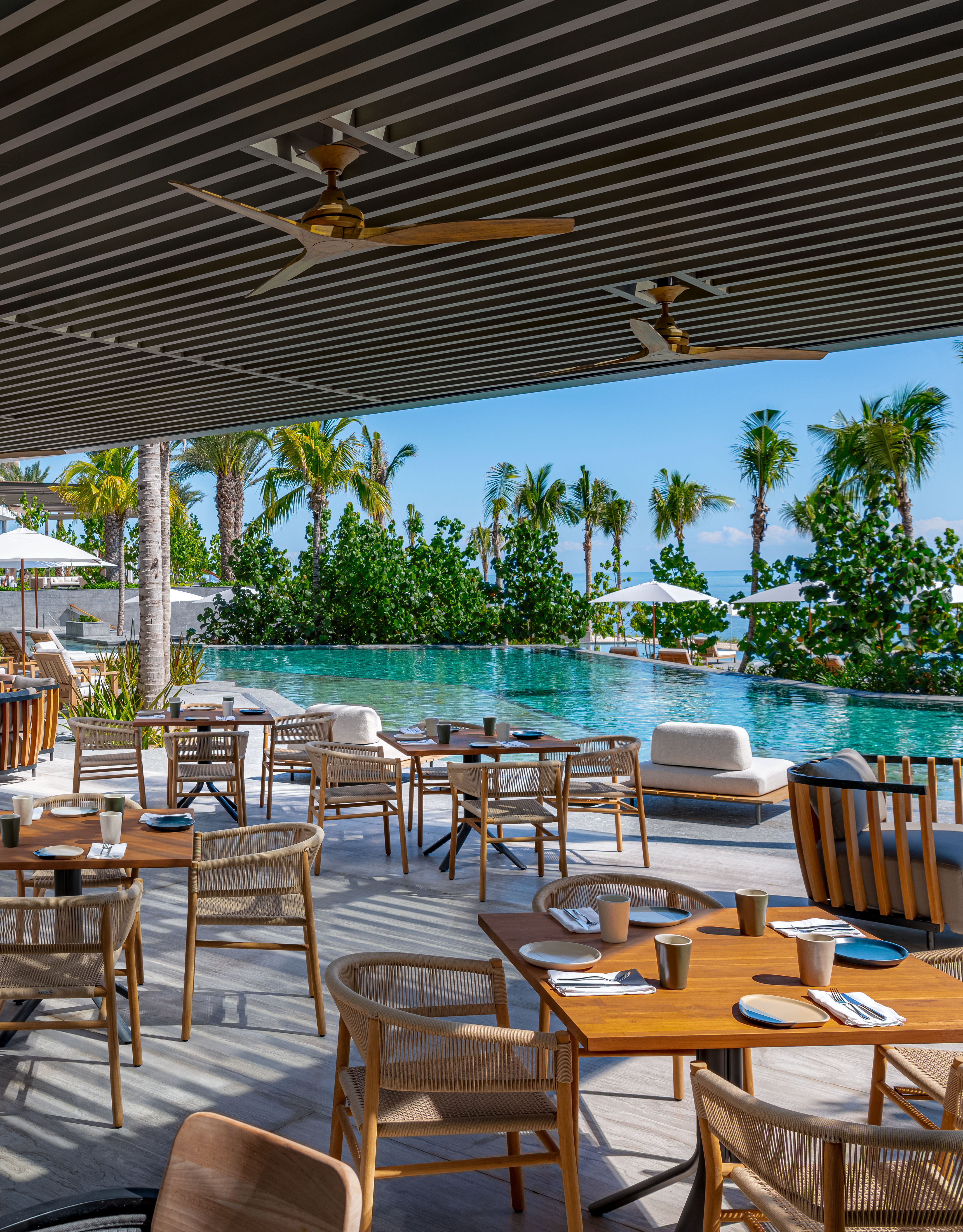 outdoor dining seating by pool