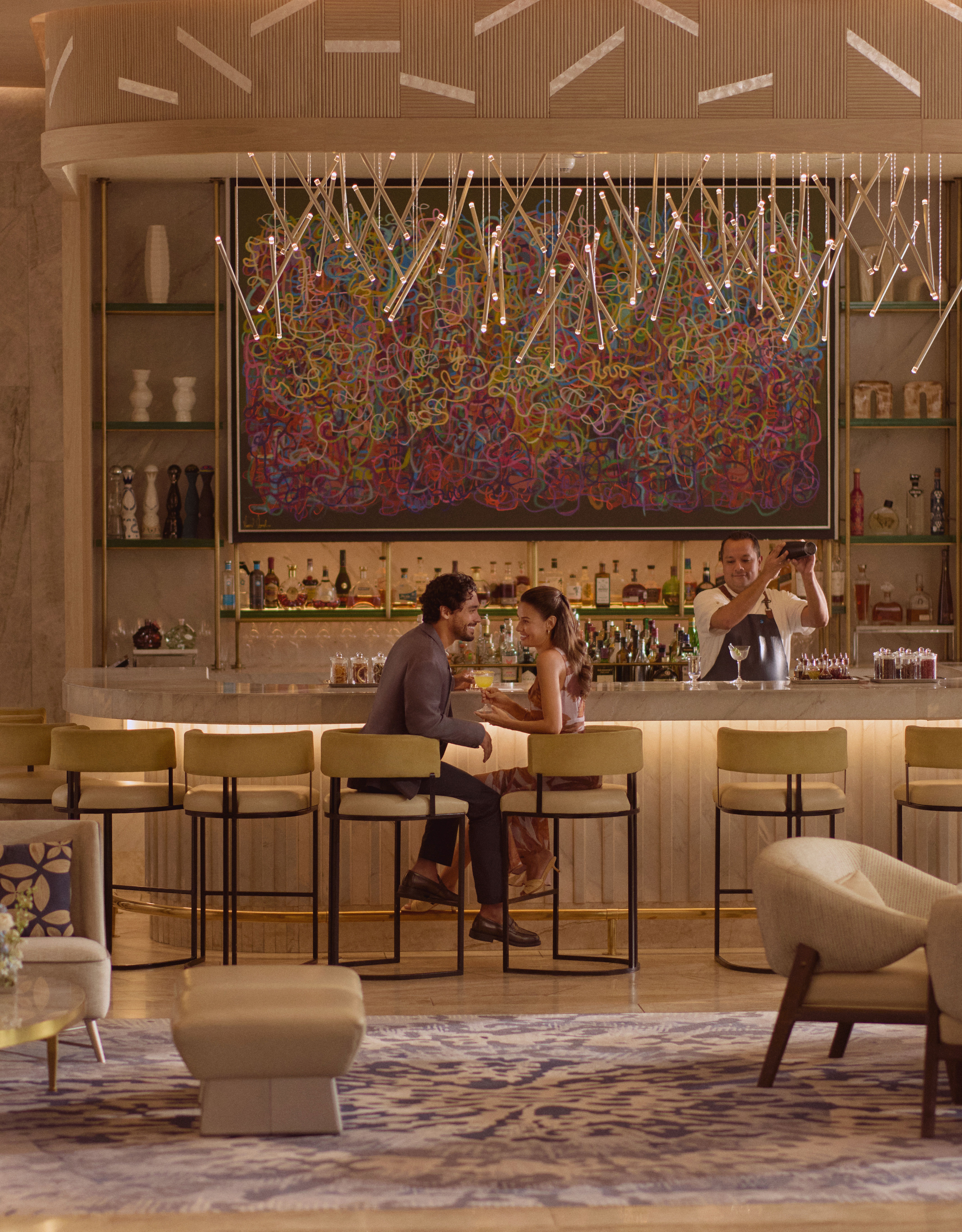 couple sitting by bar