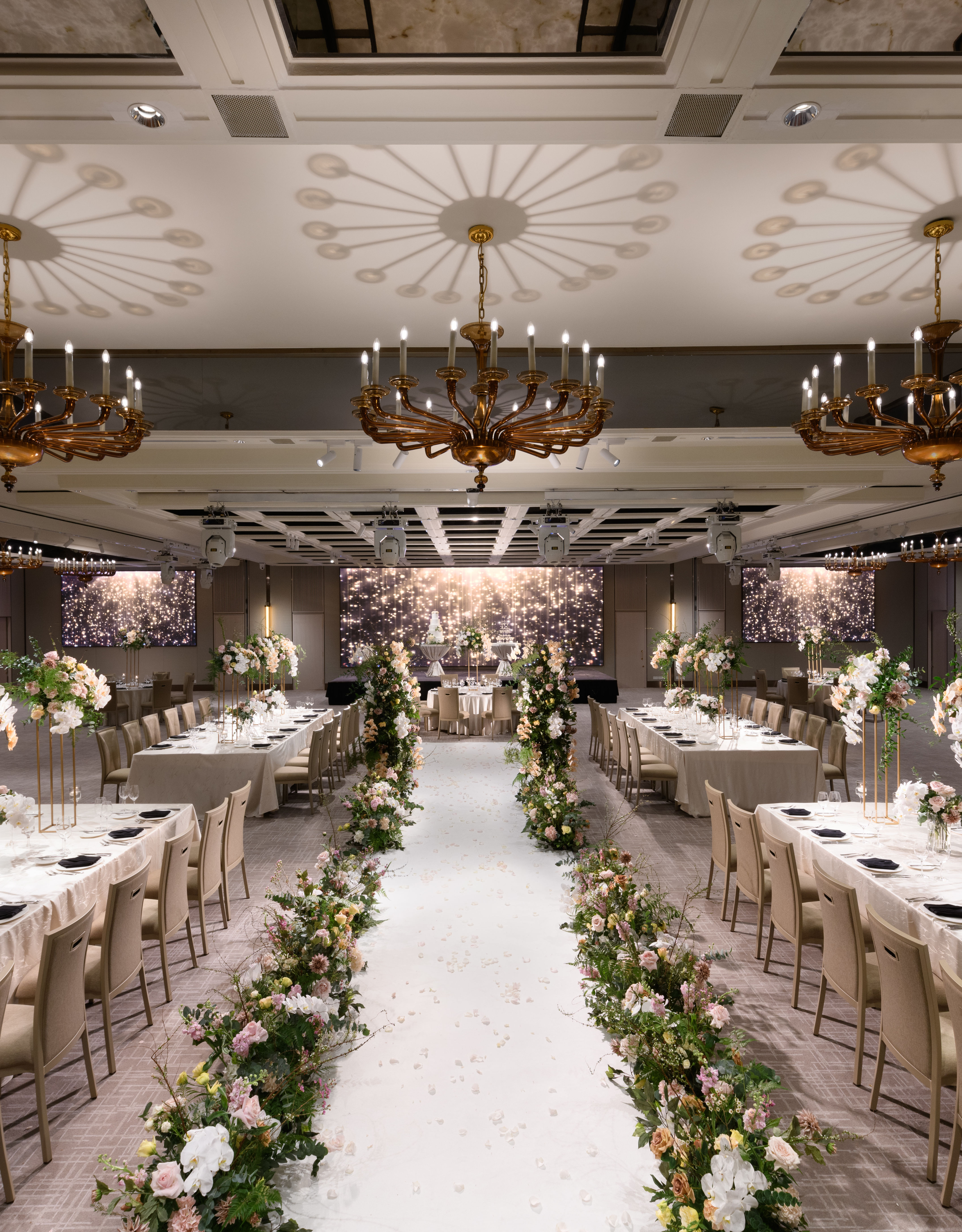 Royal Pavilion Ballroom with tables, chairs and chandeliers