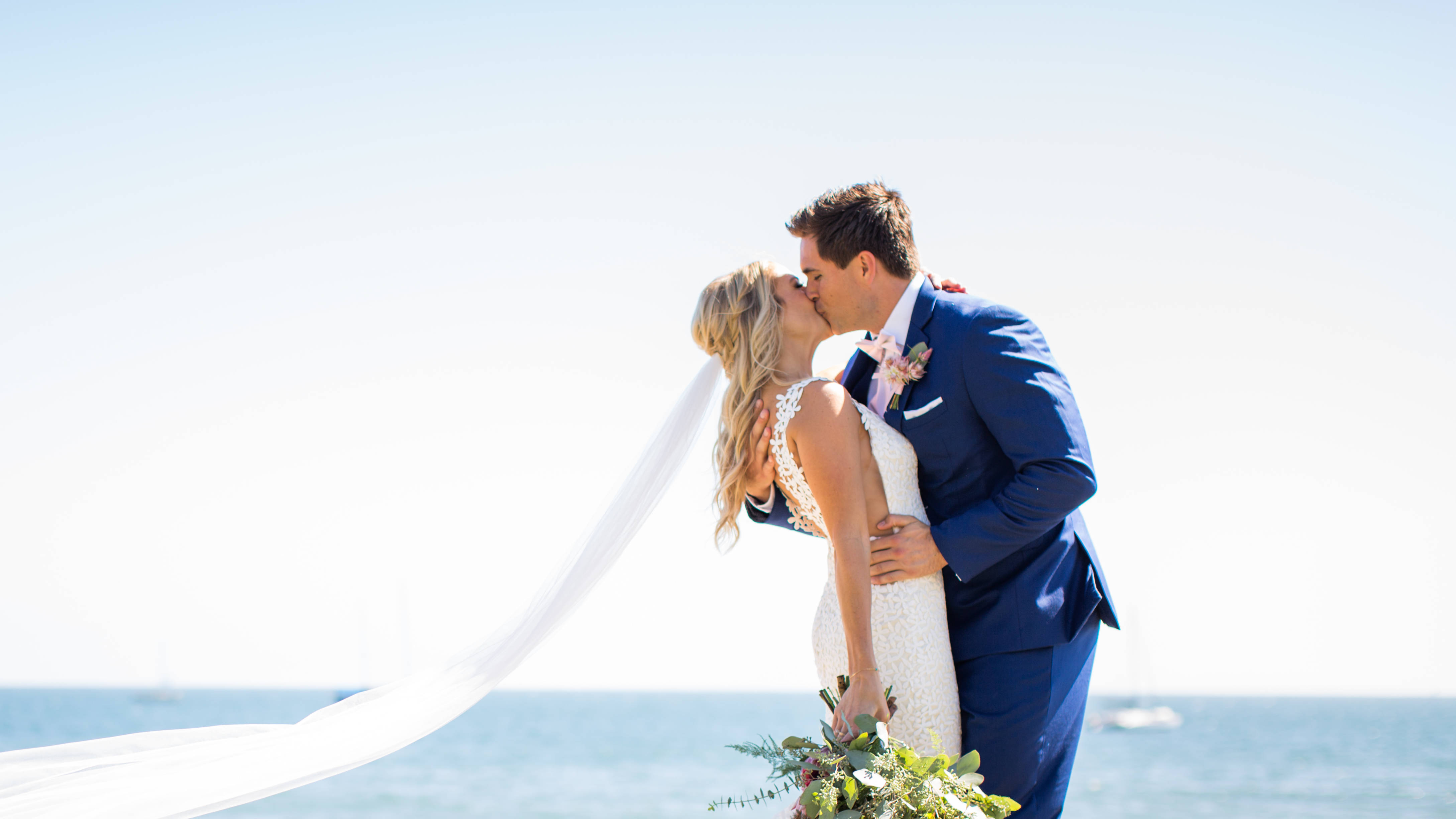 bride and groom on beach