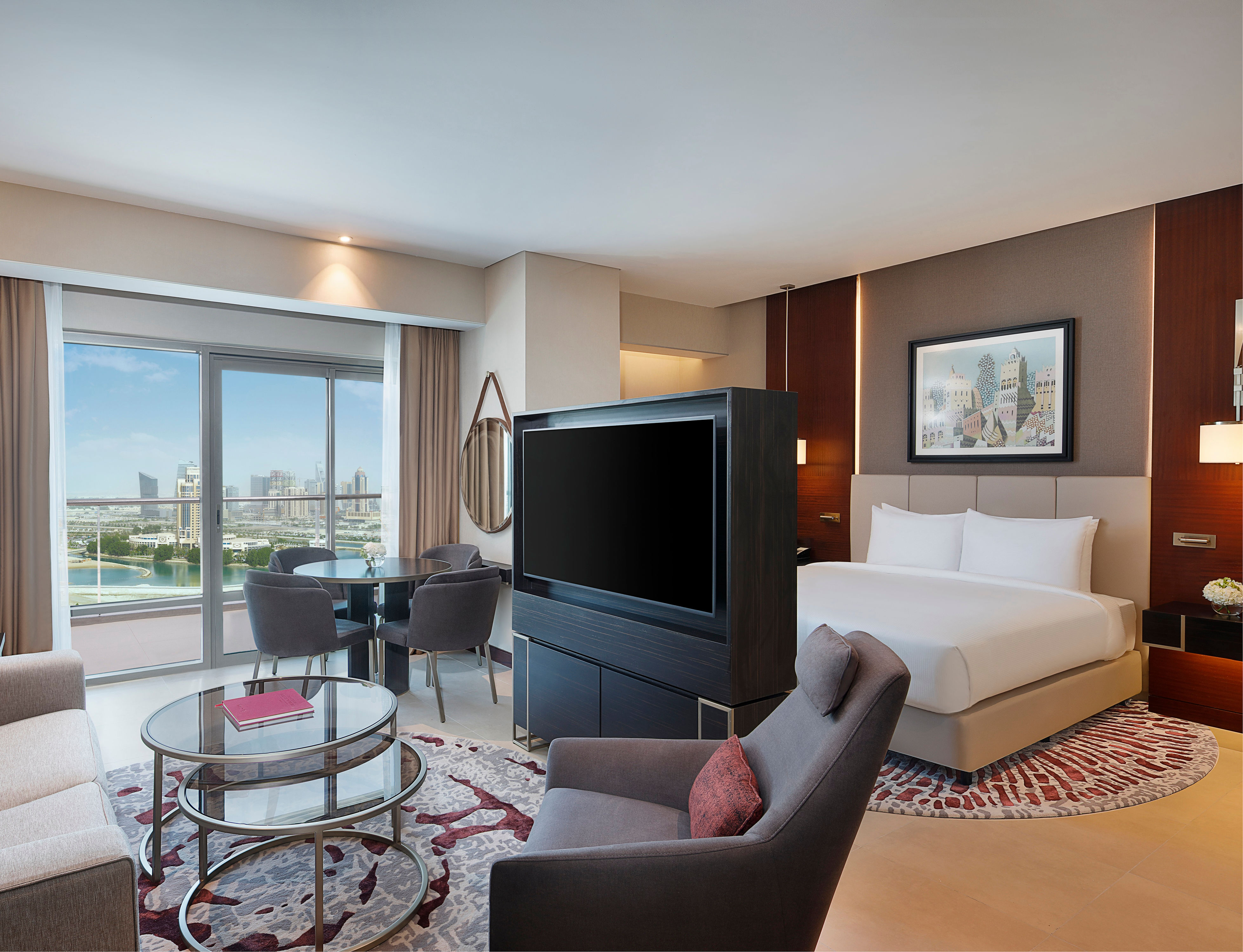 Lounge area with comfortable seating, table and chairs