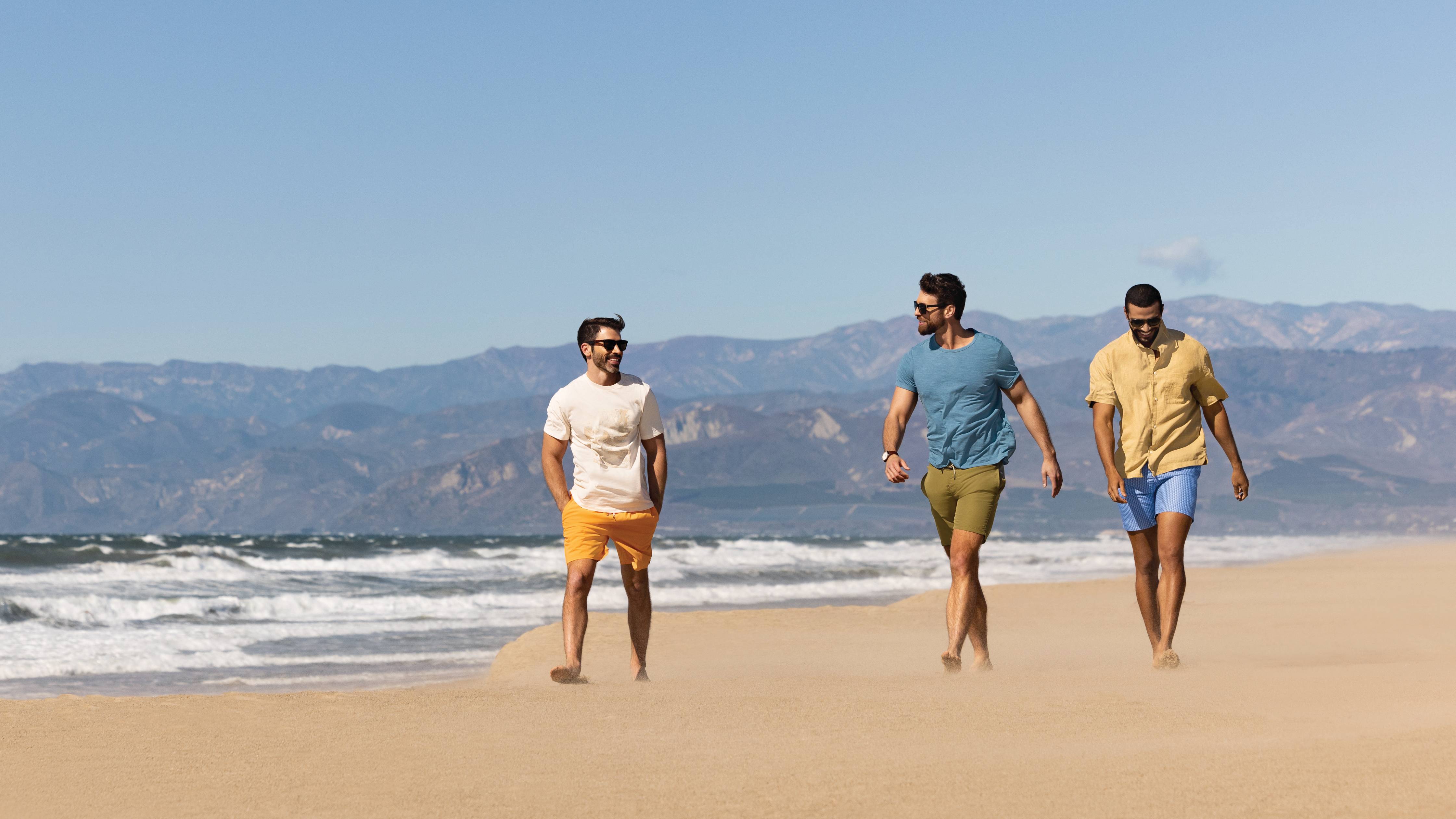 Three Men Walking on the Beach
