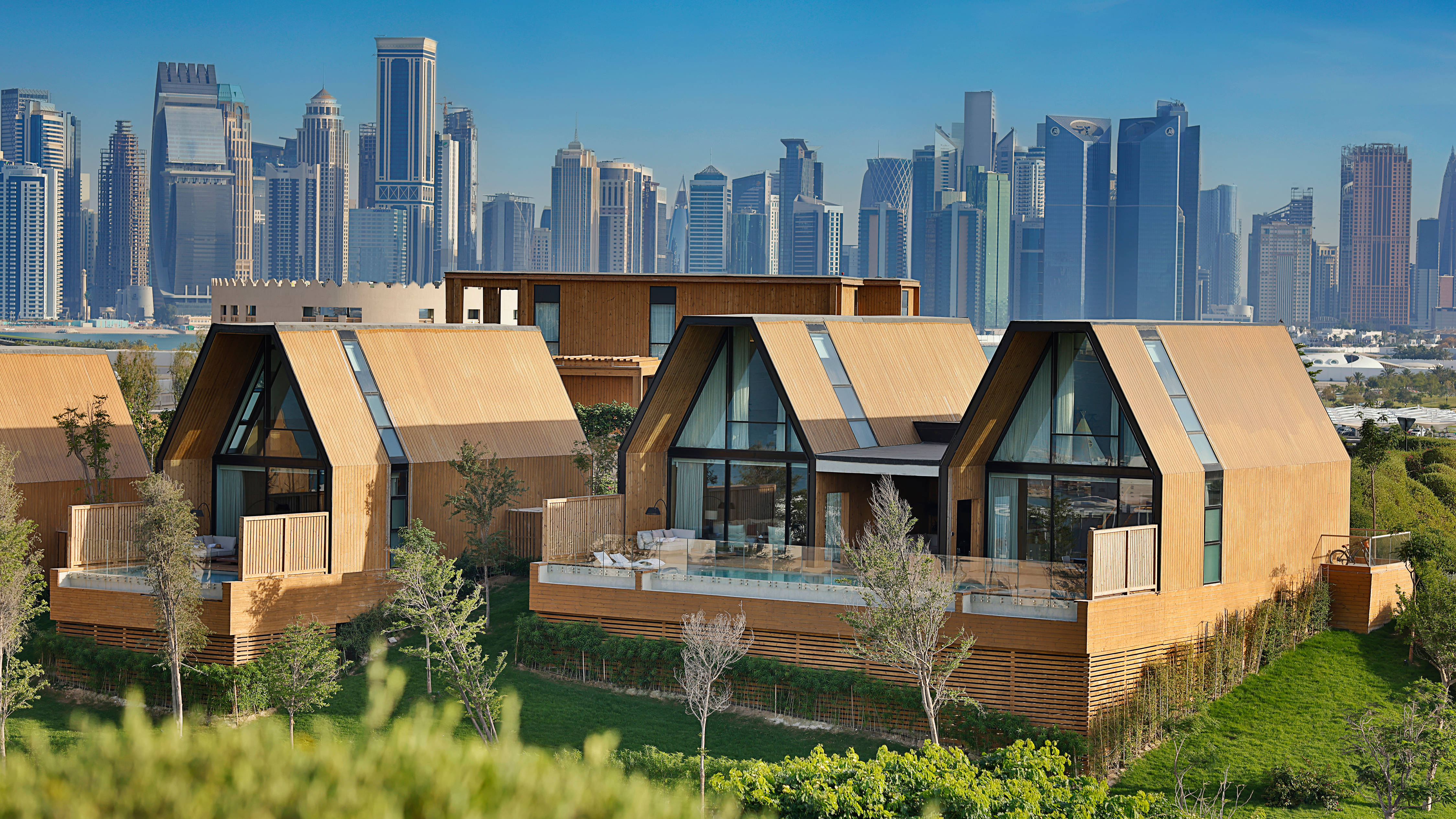 Hotel Exterior and View of a Large City in Background