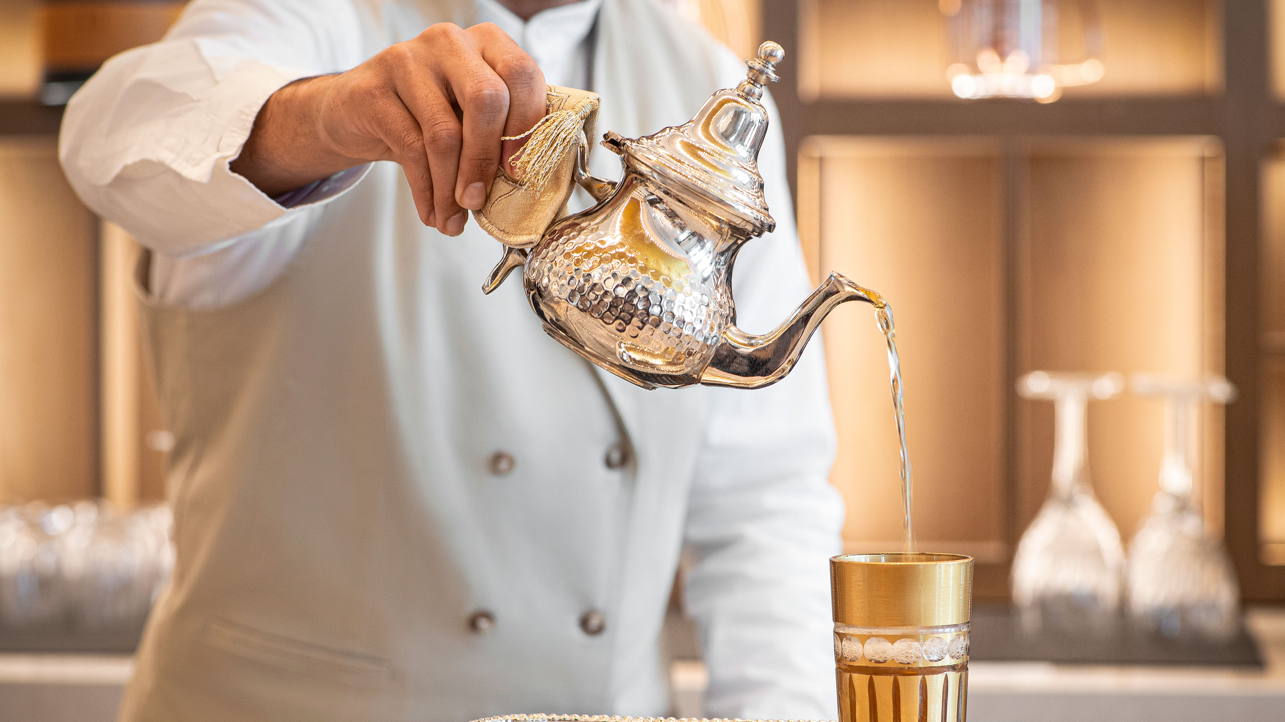 Feuillage Tea Lounge chef pouring tea