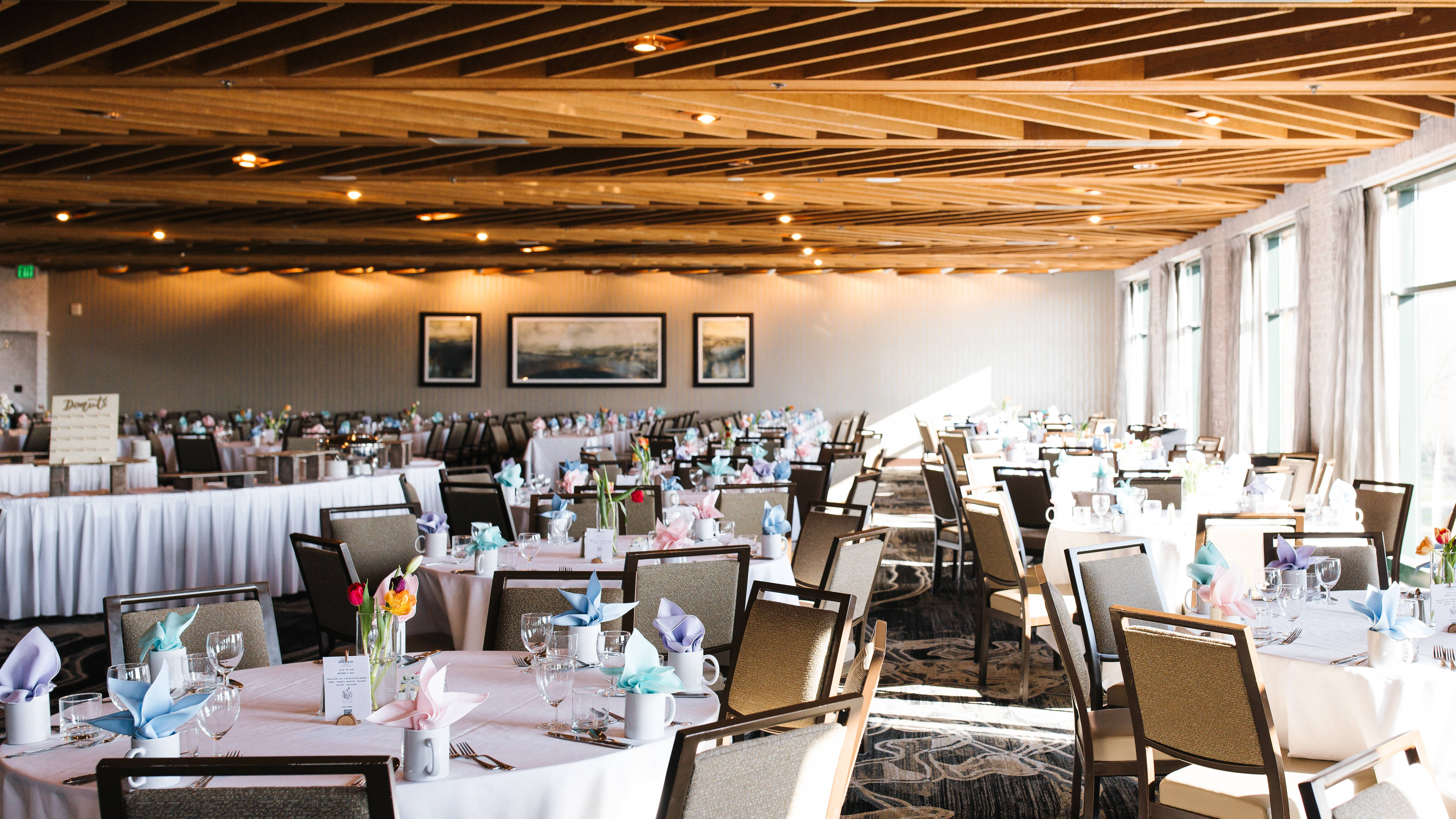 round tables with dinner ware, brunch set up