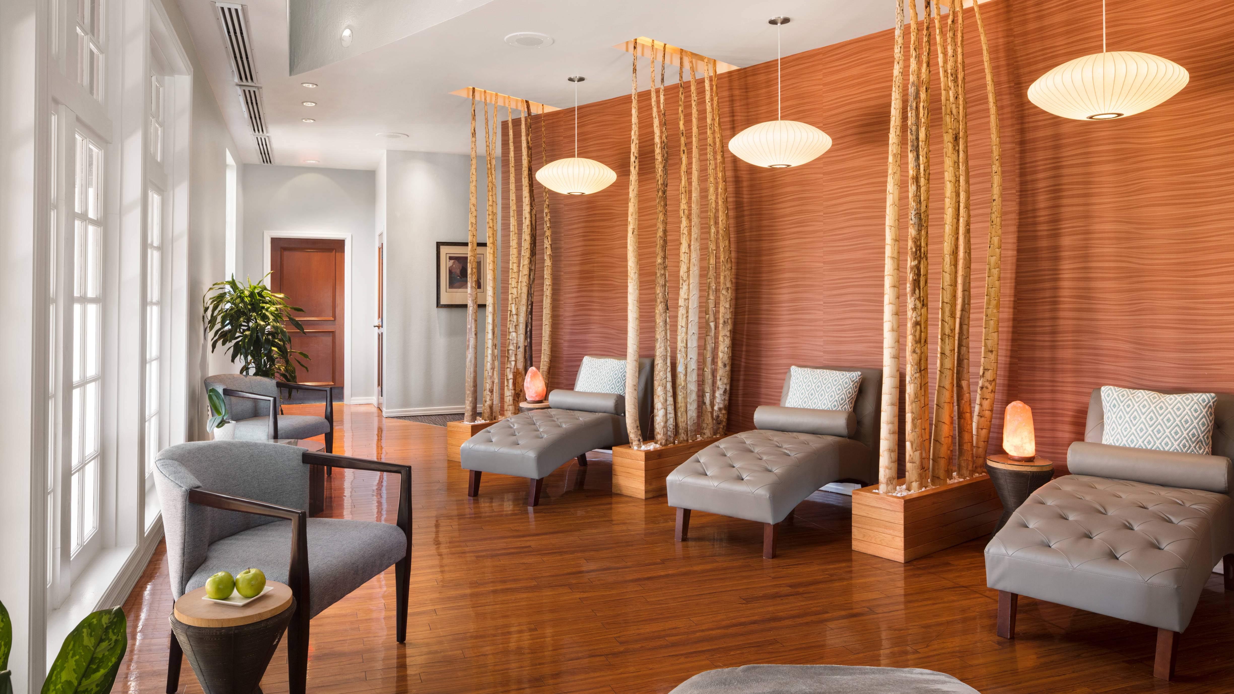 Spa Treatment Area with Spa Massage Beds and Armchairs