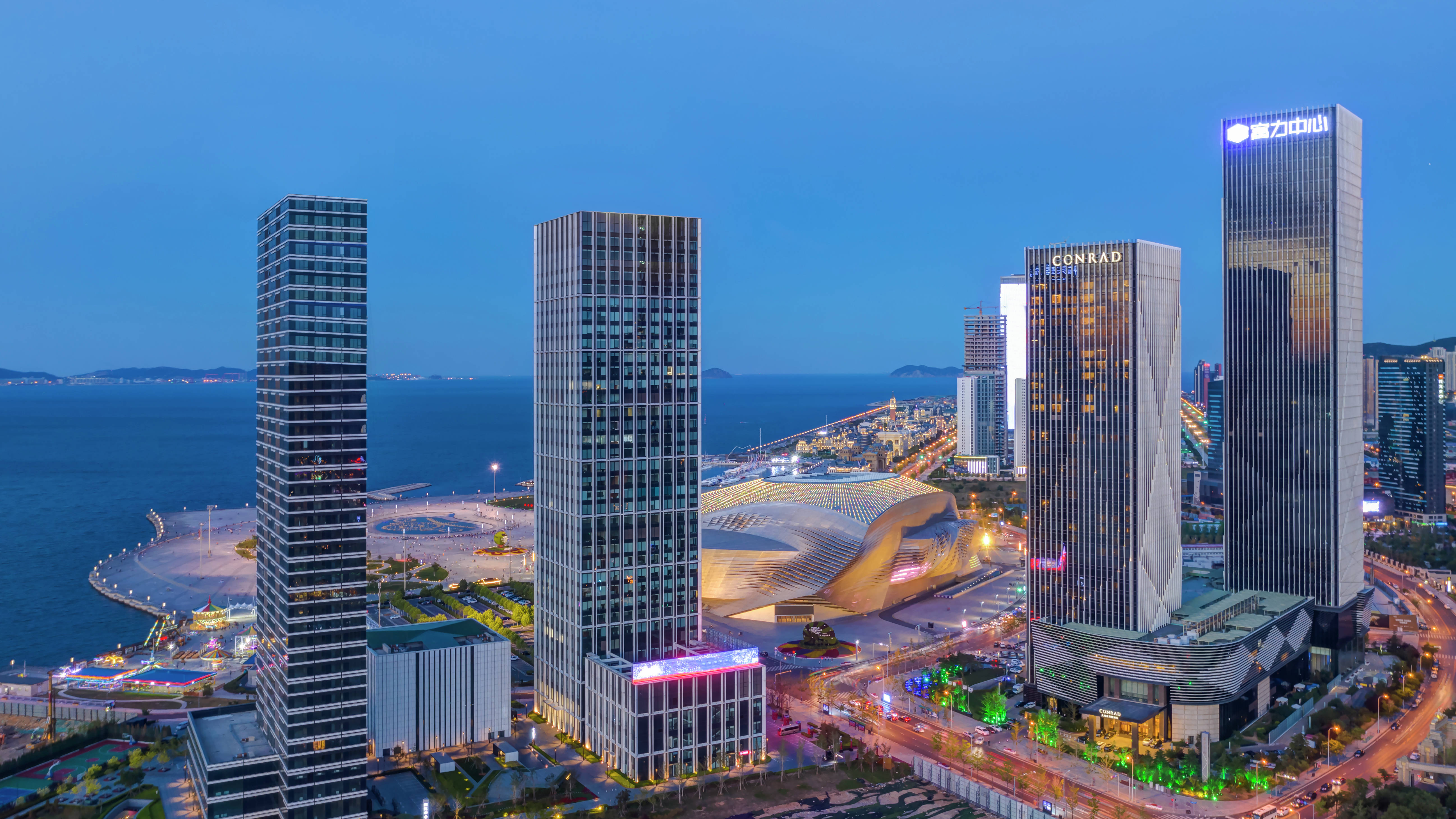 Hotel exterior at night with roads