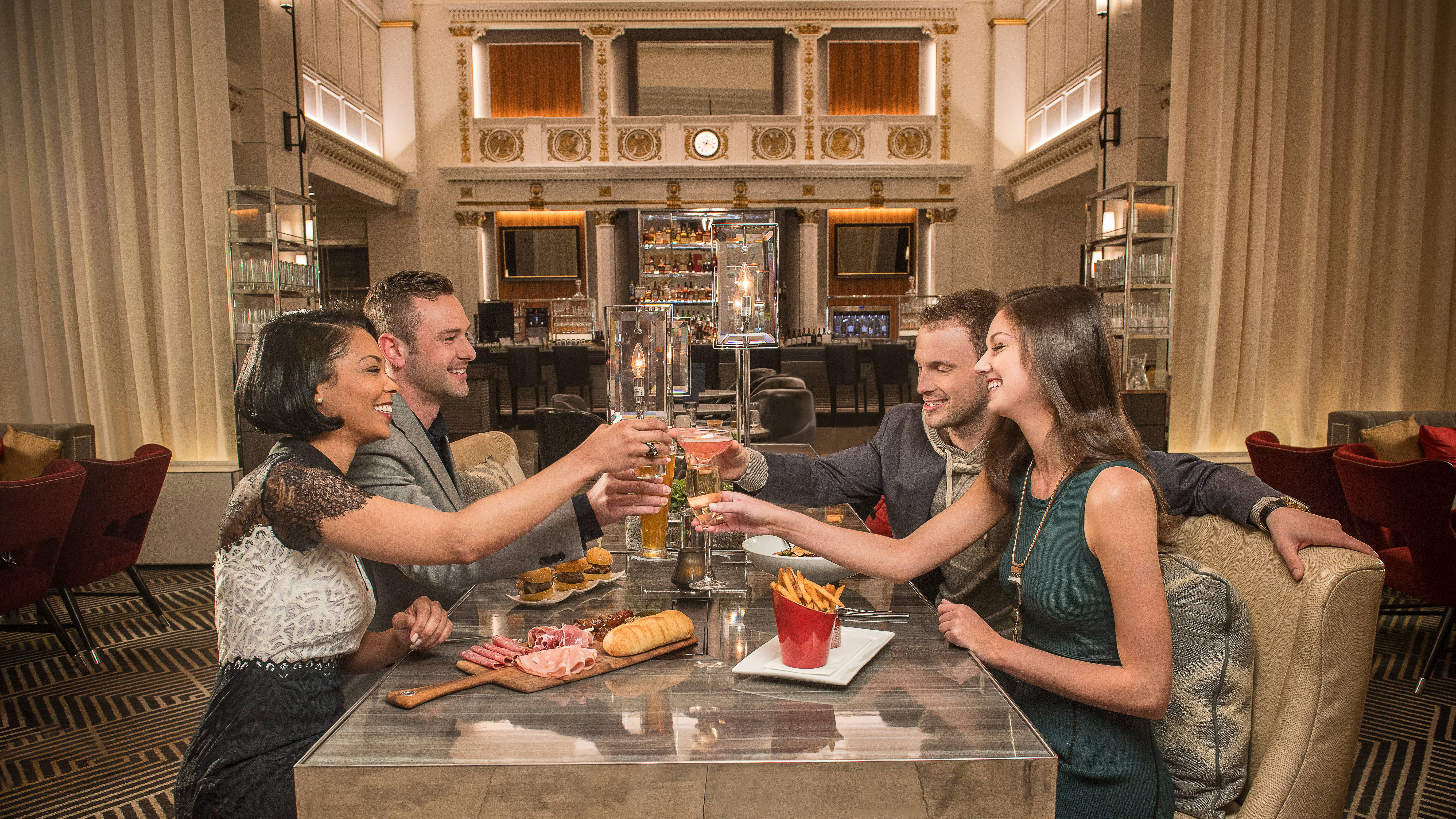 two couples dining in a restaurant