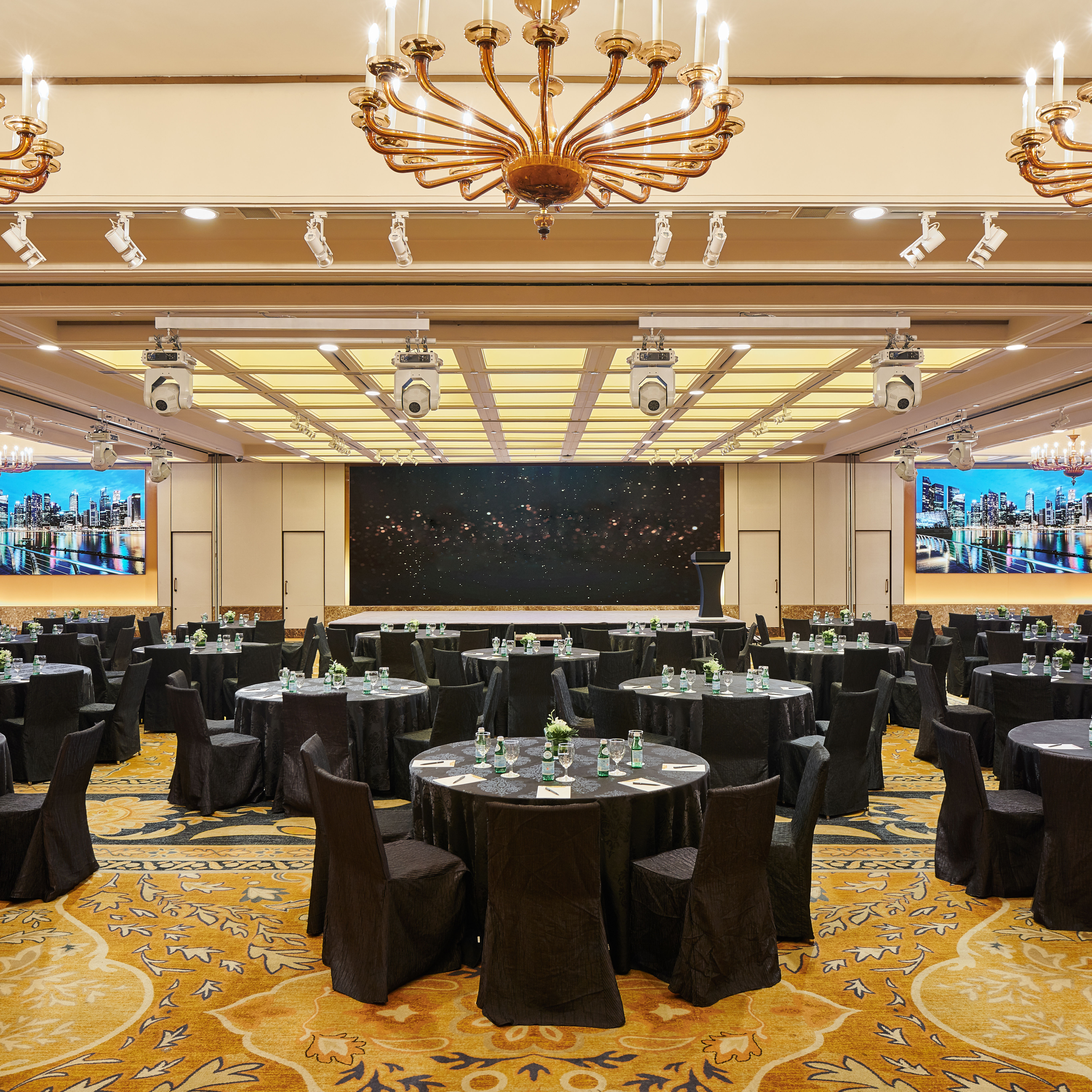 Royal Pavilion Ballroom setup for meeting with round tables
