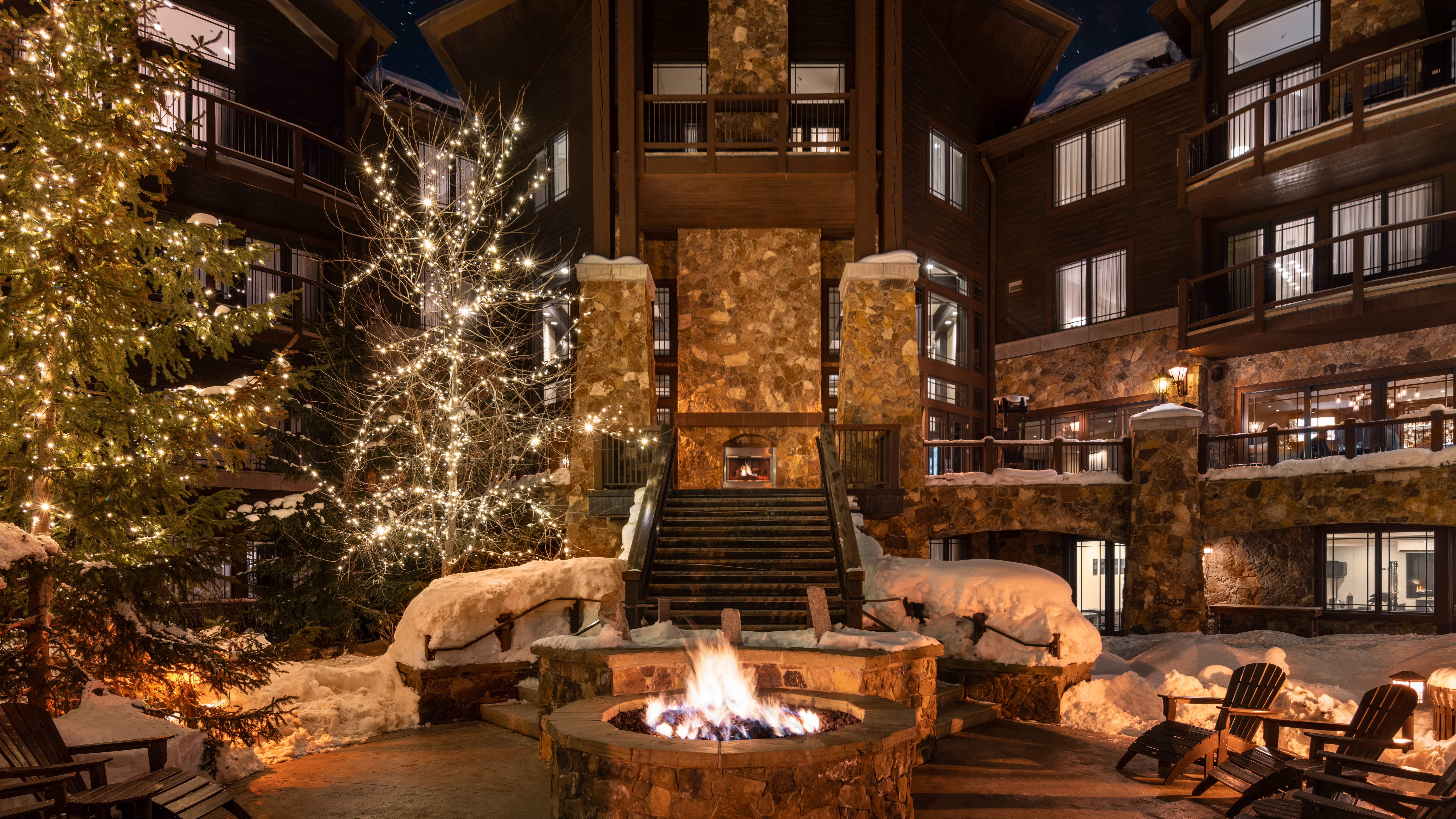 Hotel Exterior and Fire Place in Outdoor Patio