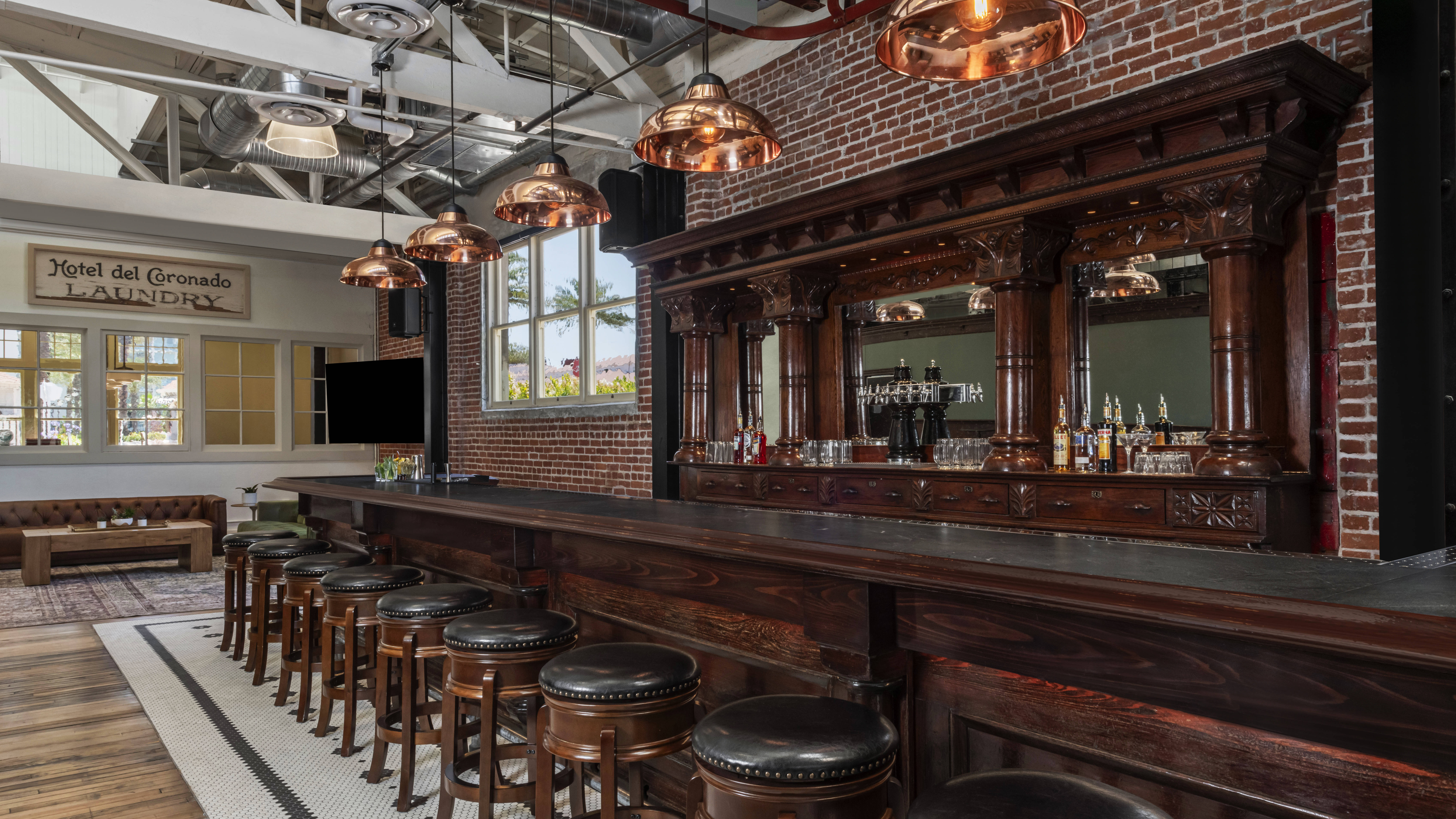 Bar area with stools and lighting