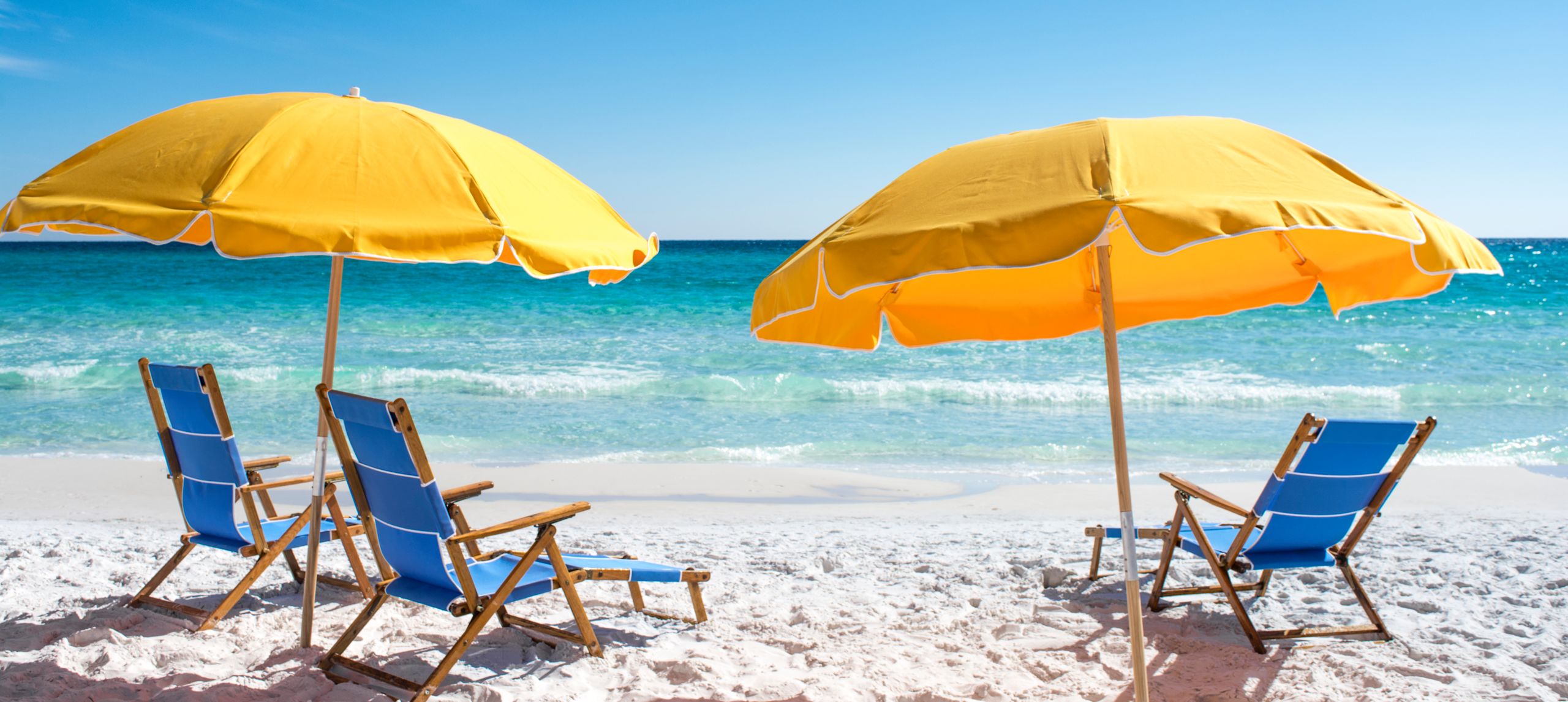 Beach chairs and umbrellas at Hilton Sandestin Beach Golf Resort and Spa