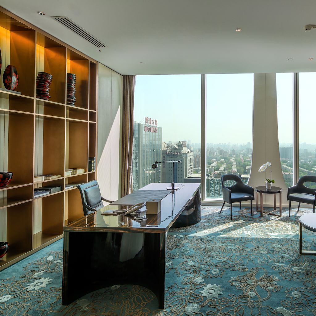 Private Study Room with Work Desk, Lounge Sofa, Coffee Table, Chairs, Bookshelf, and Floor-to-ceiling Windows