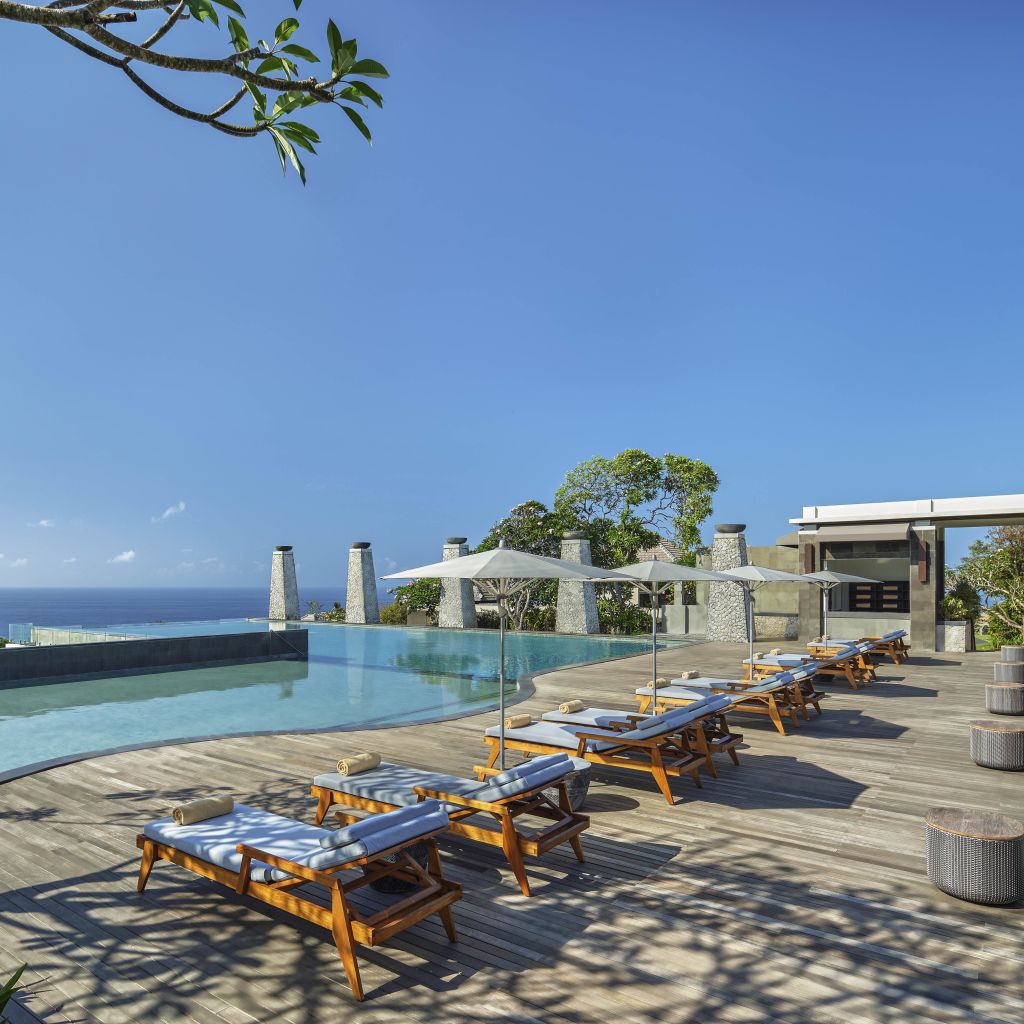 Outdoor Pool Area with Lounge Chairs