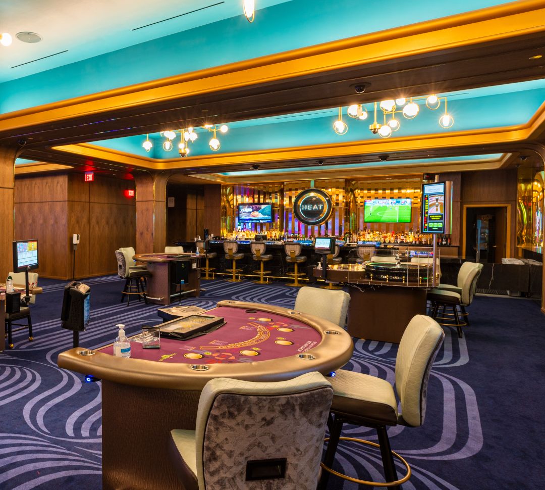 Casino interior with gaming machines and tables