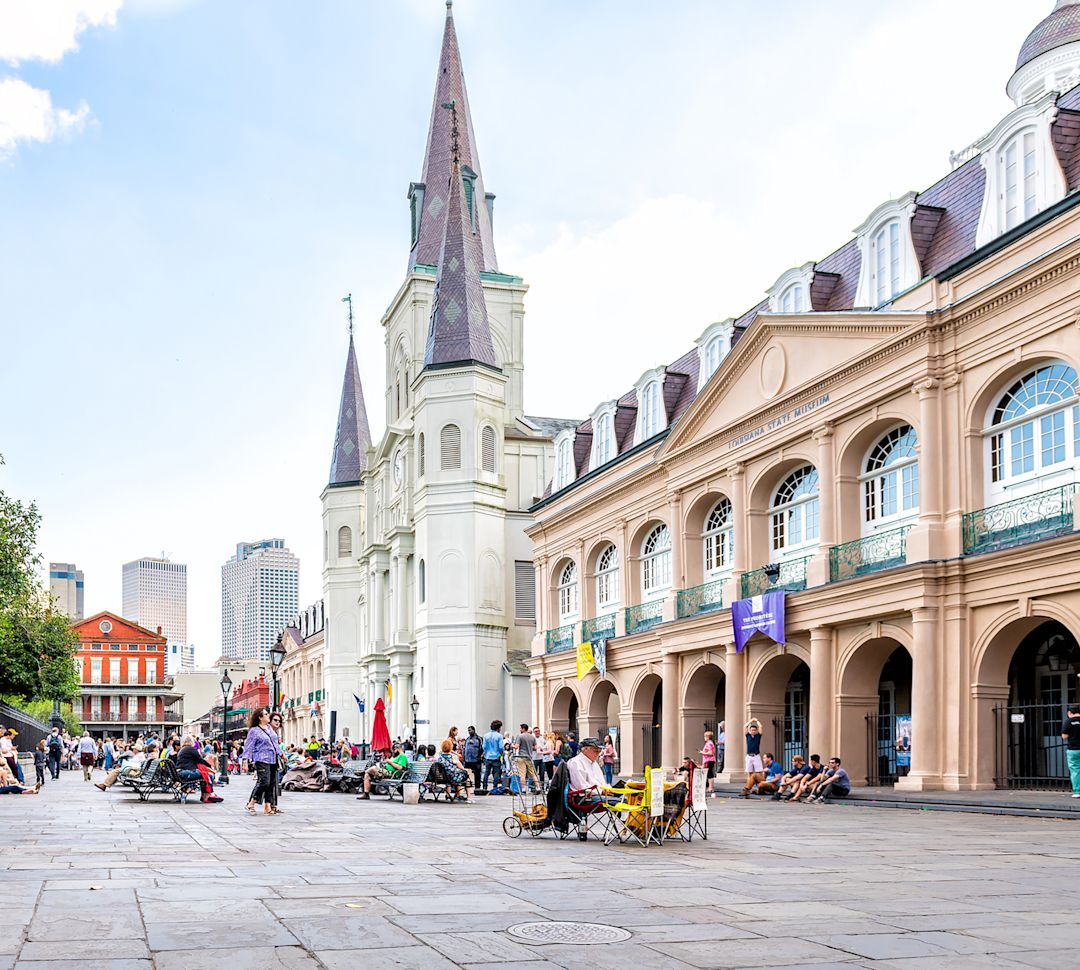 People Walking  by a Cathedral