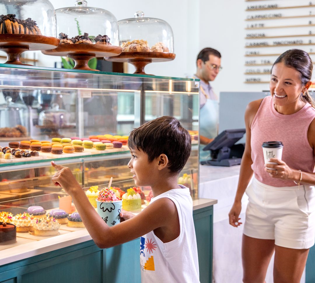 guests shopping for desserts at Little Spoon coffee shop-transition
