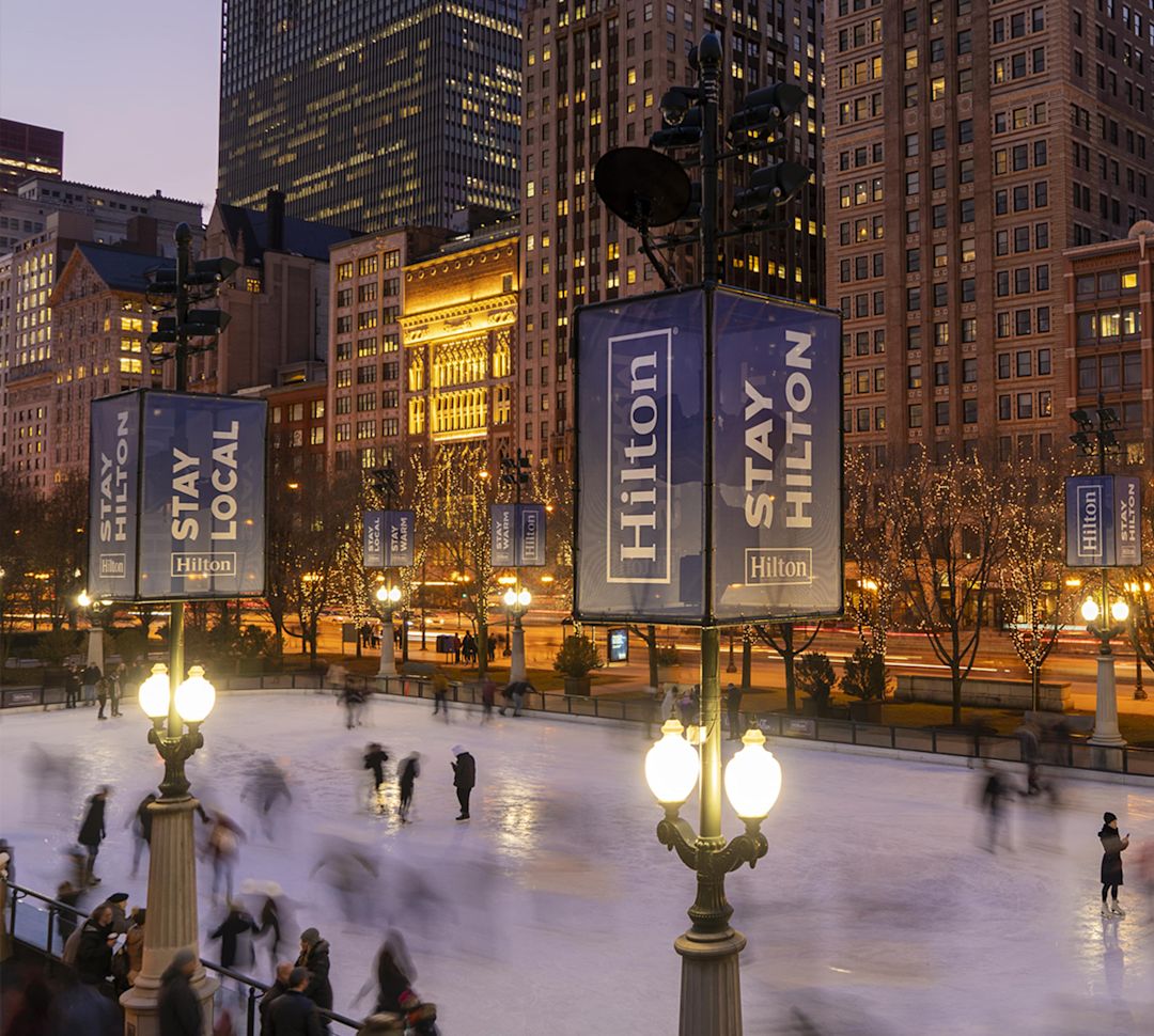 ice skating rink at night with people skating