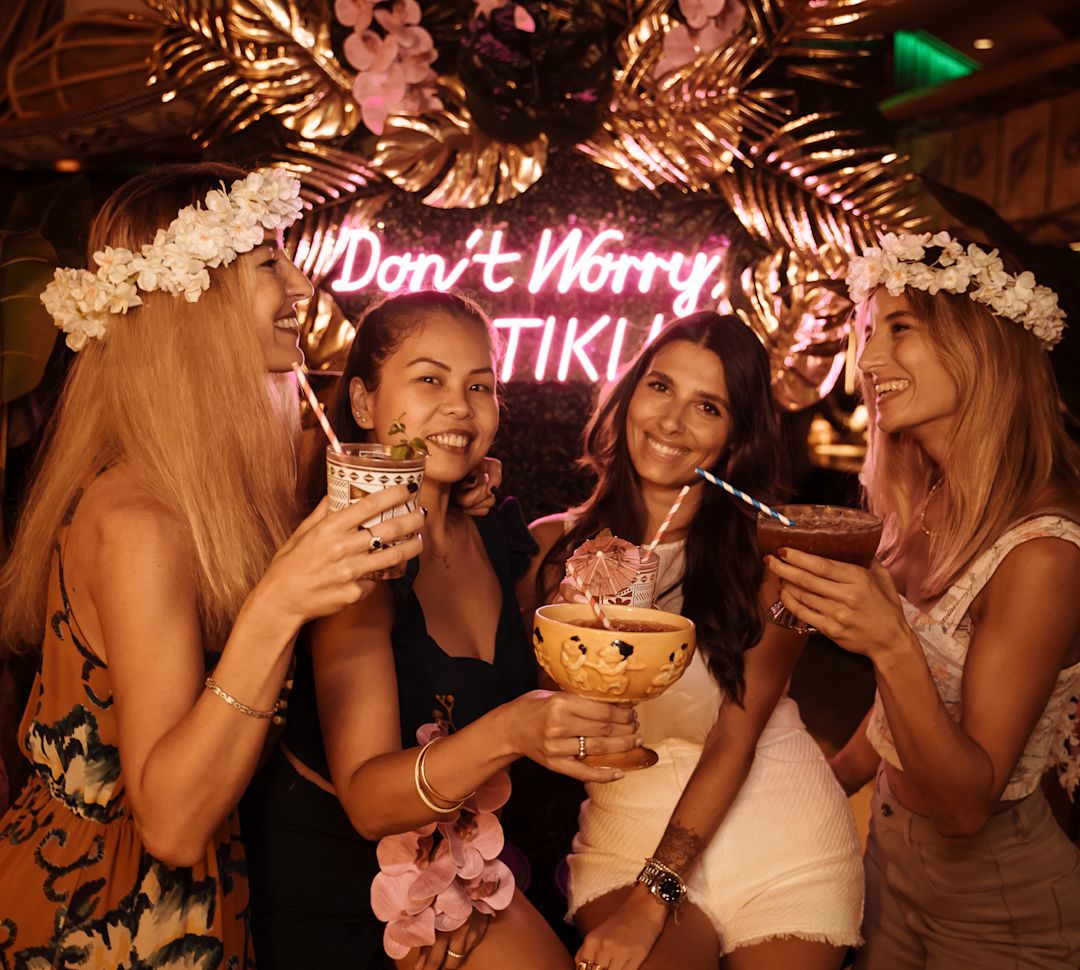 Women with drinks at Tiki Bar