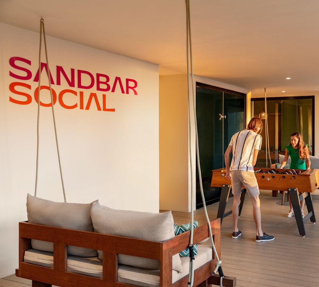 People Playing Foosball at Sandbar Social