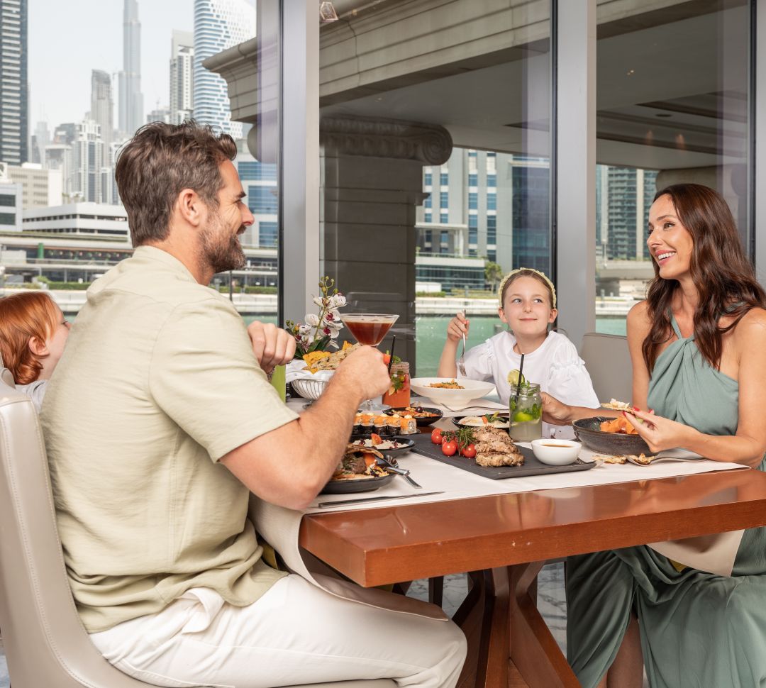 Family having dinner in restaurant