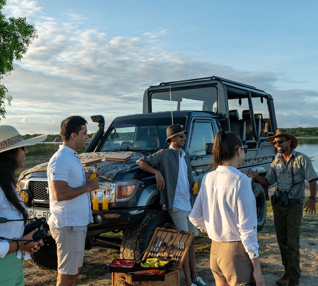 a Group of People Enjoying a Safari Program at a National Park