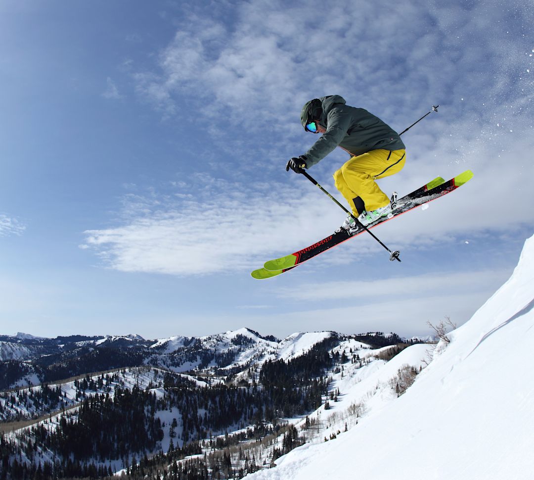 a Man Ski Jumping on a Mountain