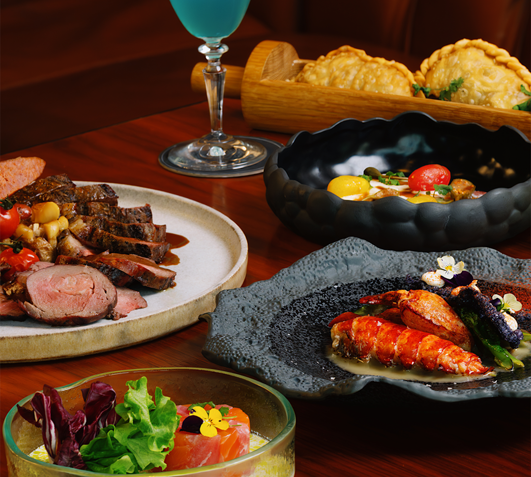 brunch entrees and a blue specialty cocktail