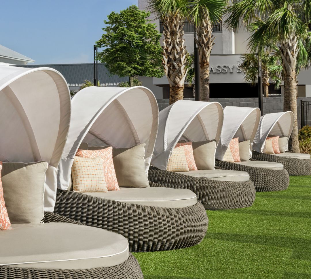 Comfortable outdoor daybeds for guests to relax