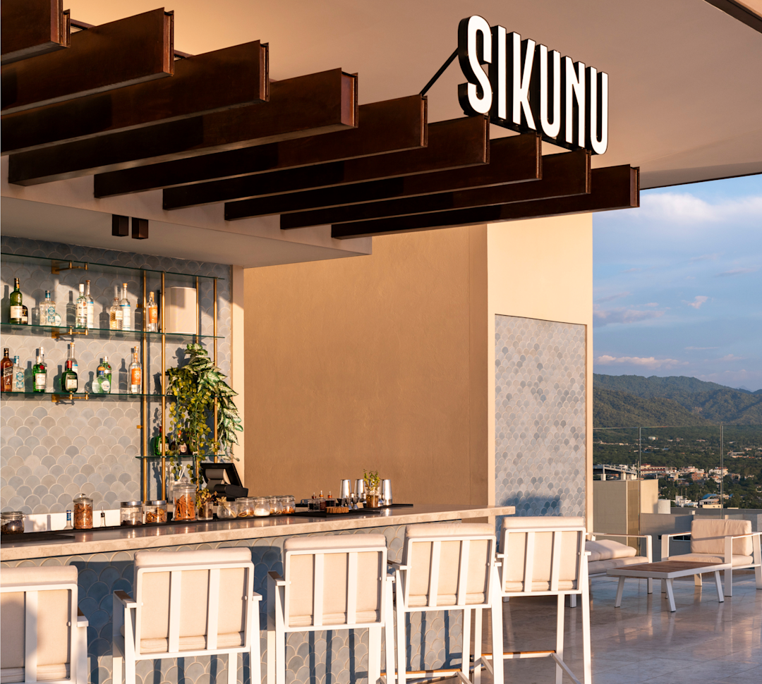 Sikunu Rooftop Bar with View of Mountains in Background-transition