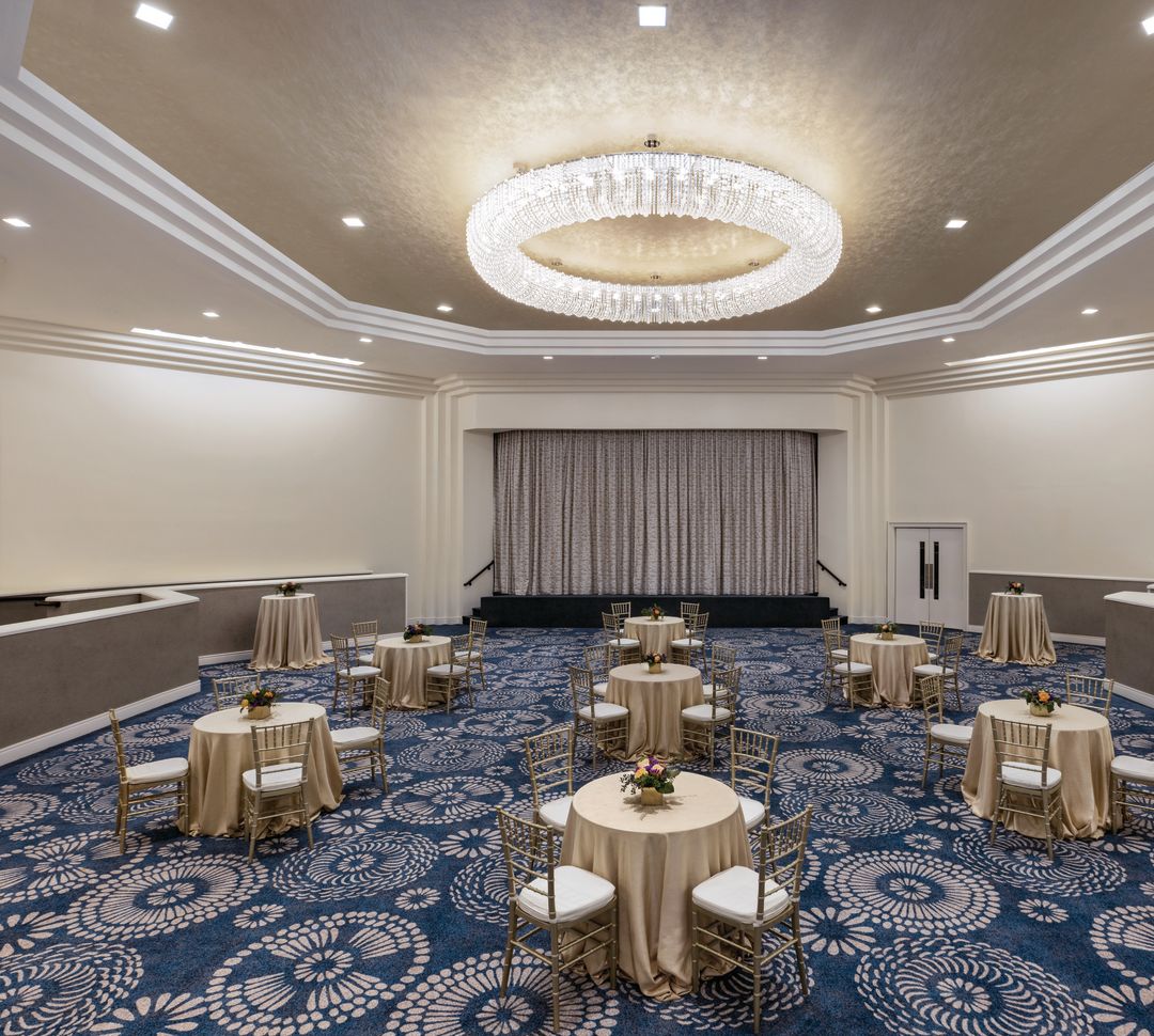 meeting room with round tables and banquet setup