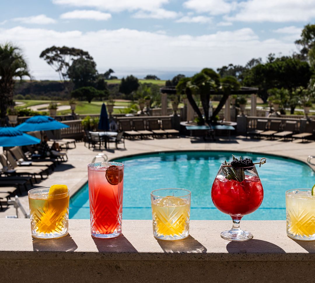 drinks sitting next to pool
